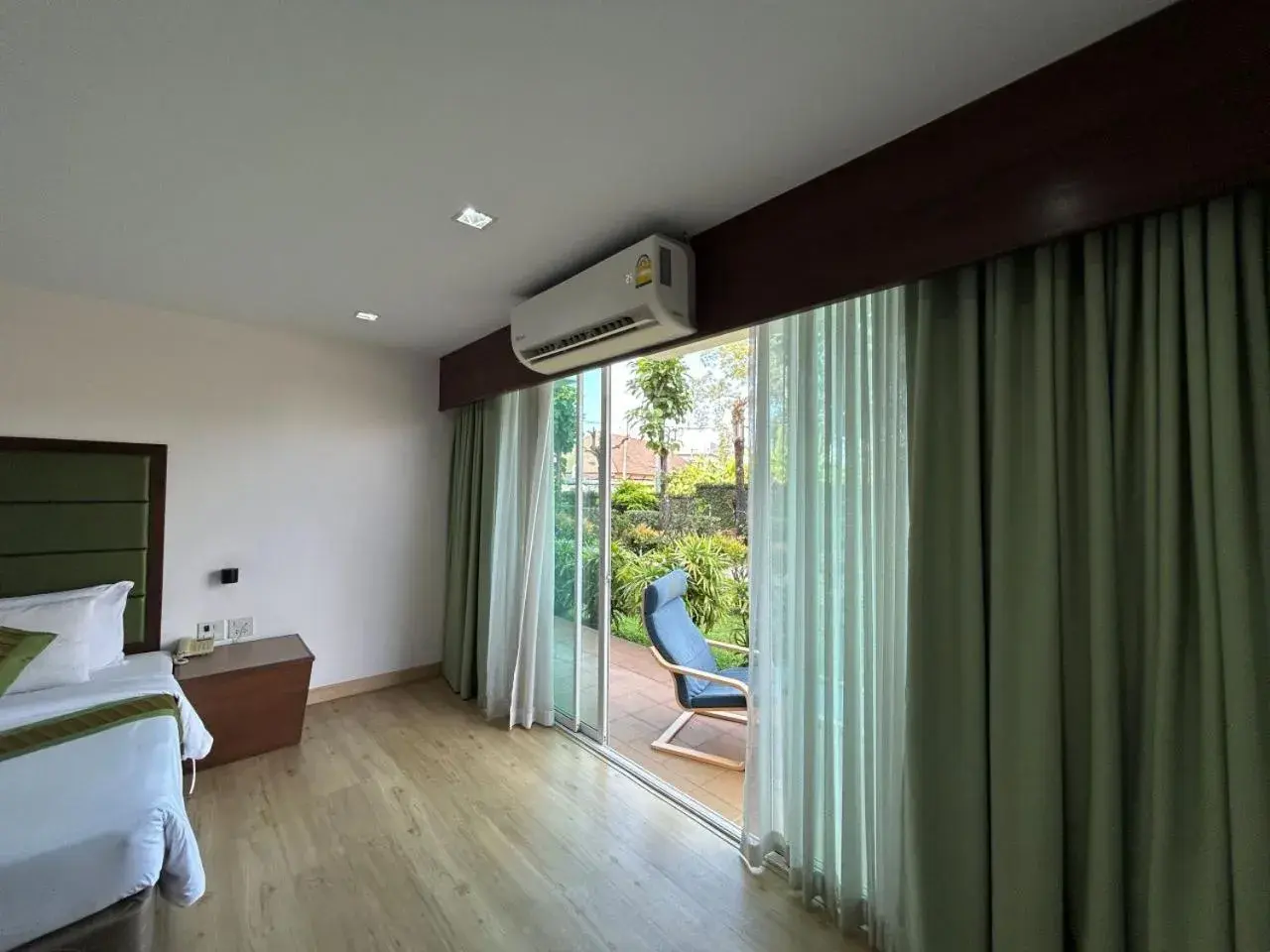 Garden view, Bed in Teak Garden Resort, Chiang Rai Garden view, Bed in Teak Garden Resort, Chiang Rai