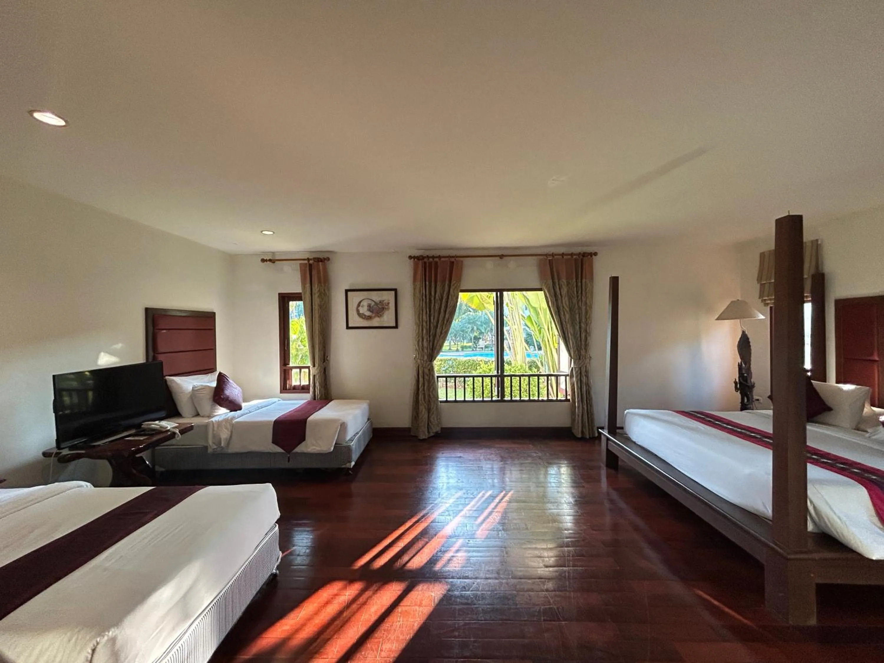 Bed in Teak Garden Resort, Chiang Rai