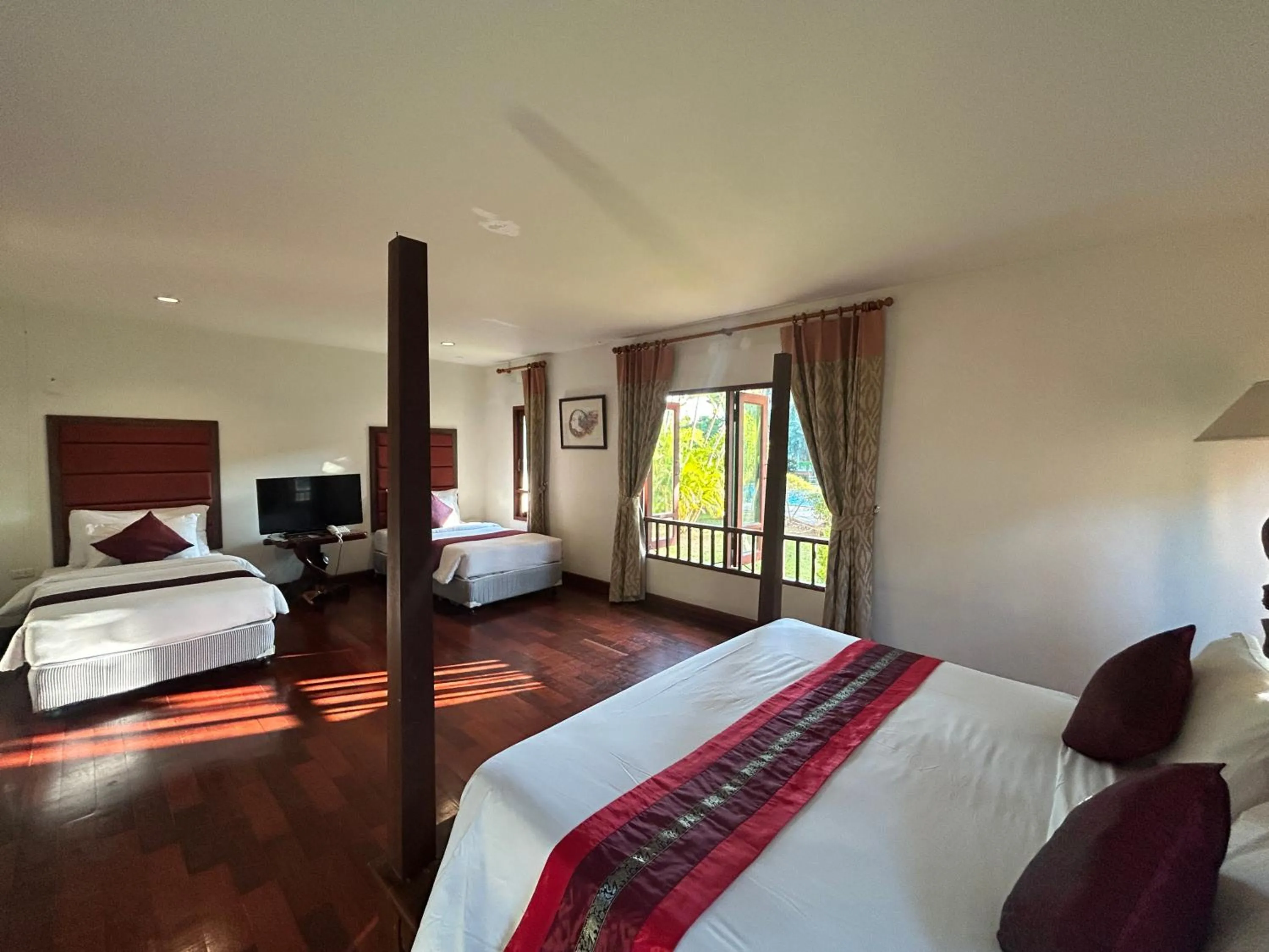 Bed in Teak Garden Resort, Chiang Rai