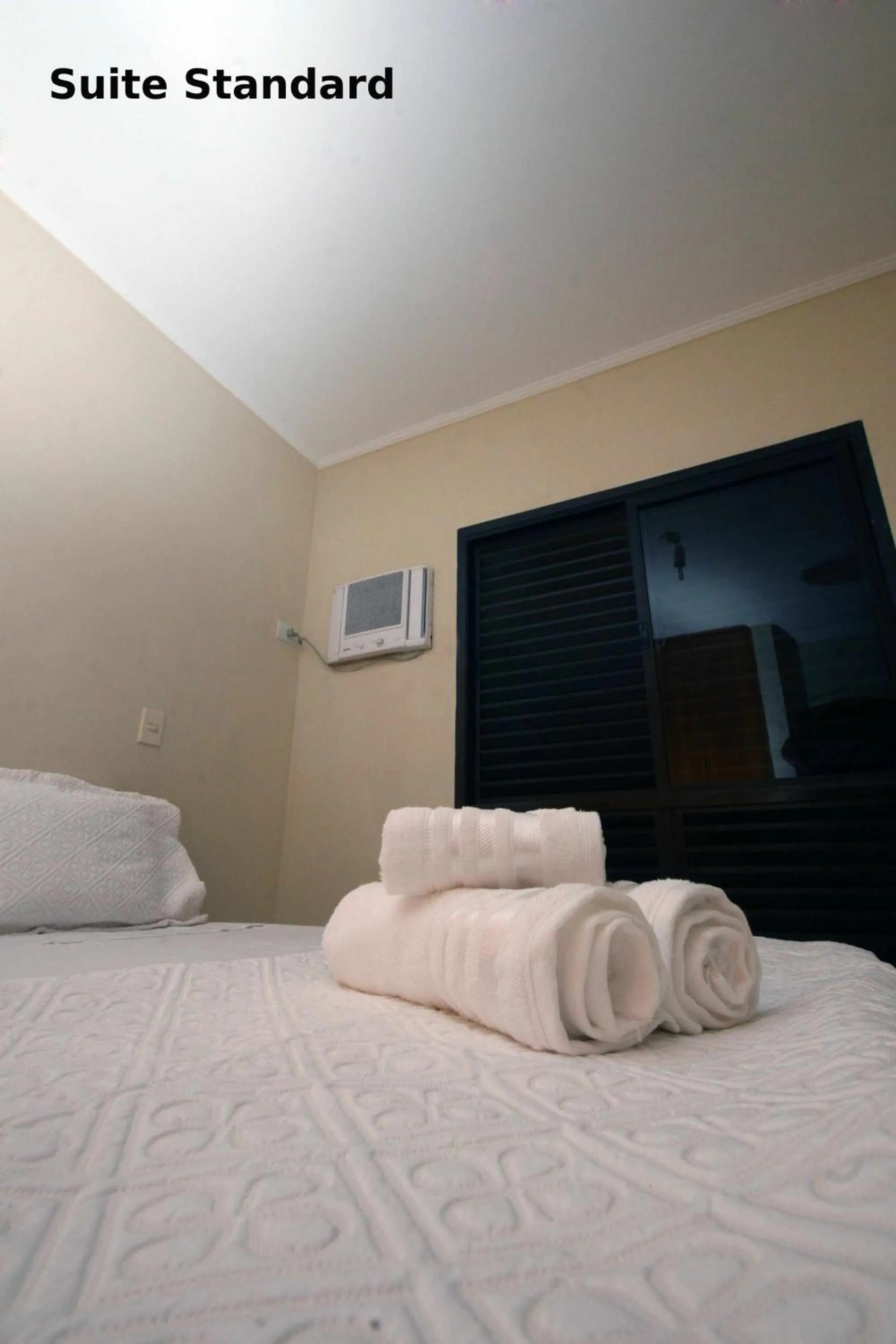 Bed in Suites Natalia Enseada