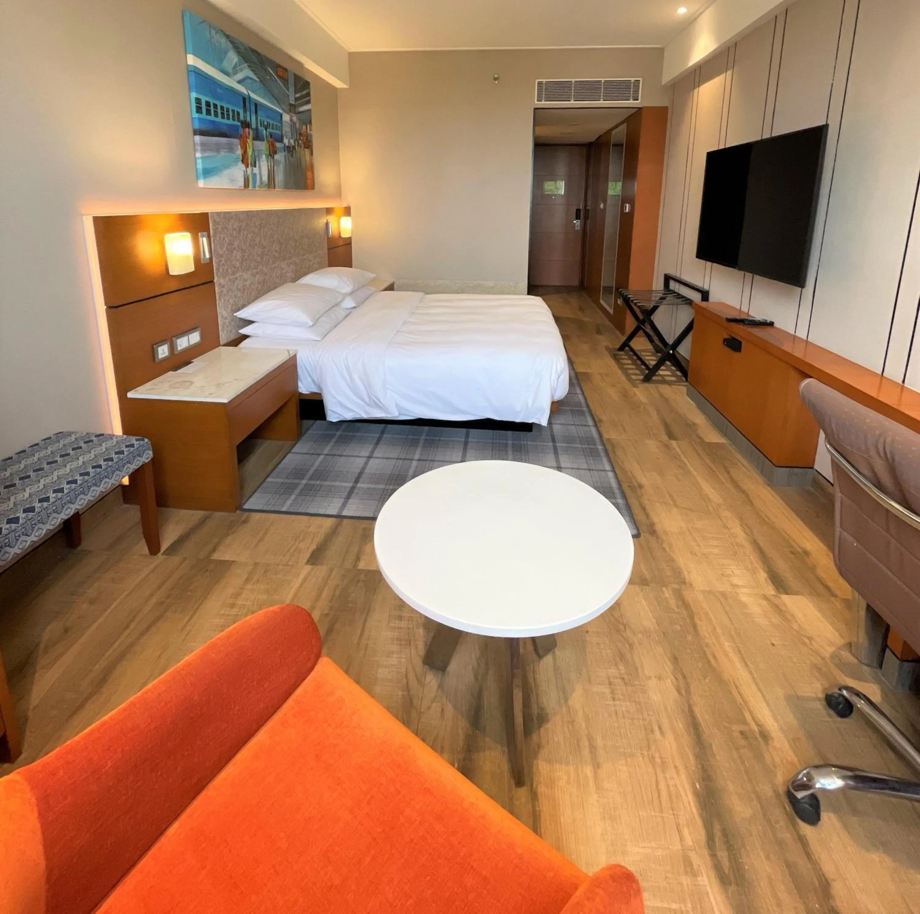 Communal lounge/ TV room, Bed in Hyatt Centric Janakpuri New Delhi