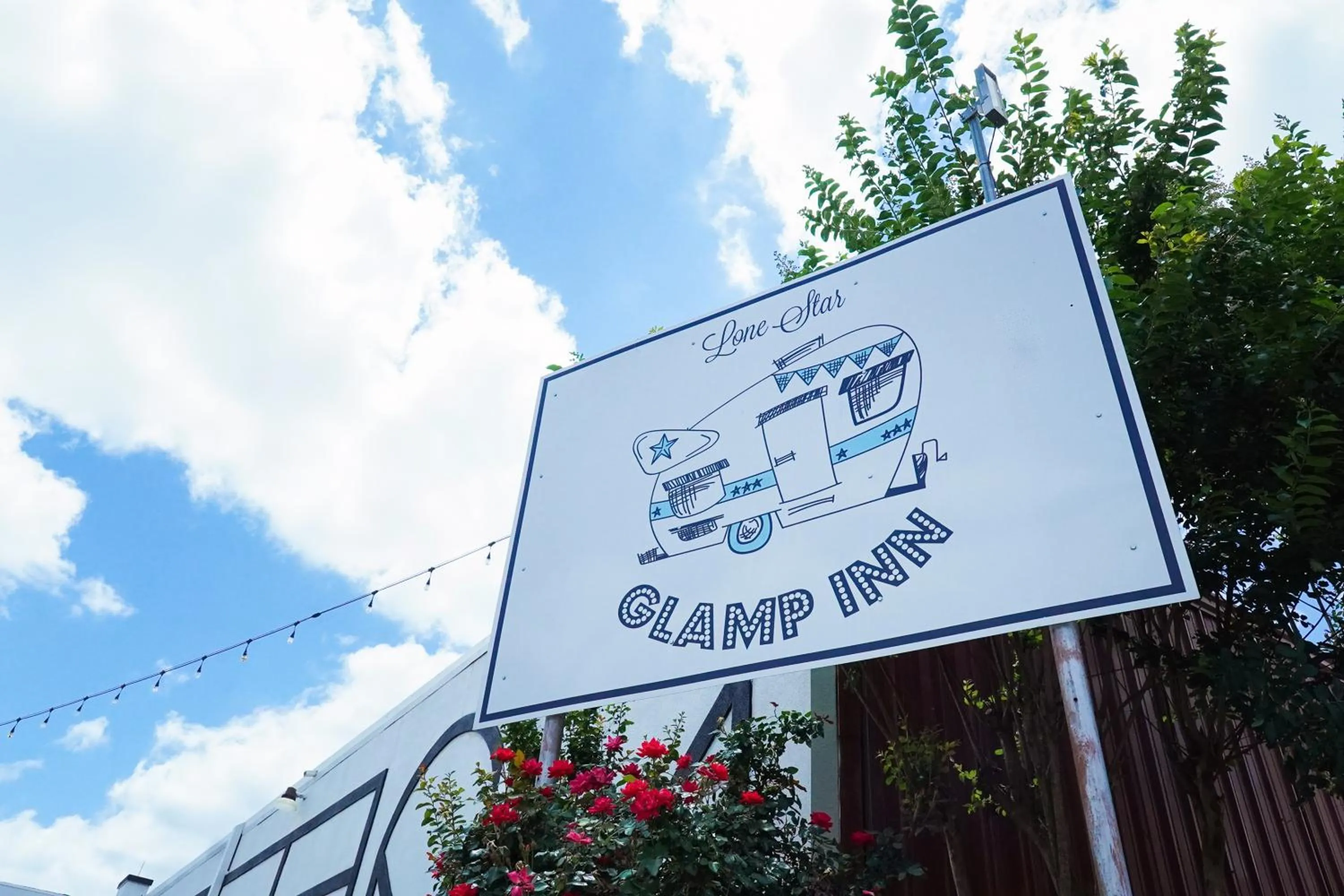 Property logo or sign in Lone Star Glamp Inn