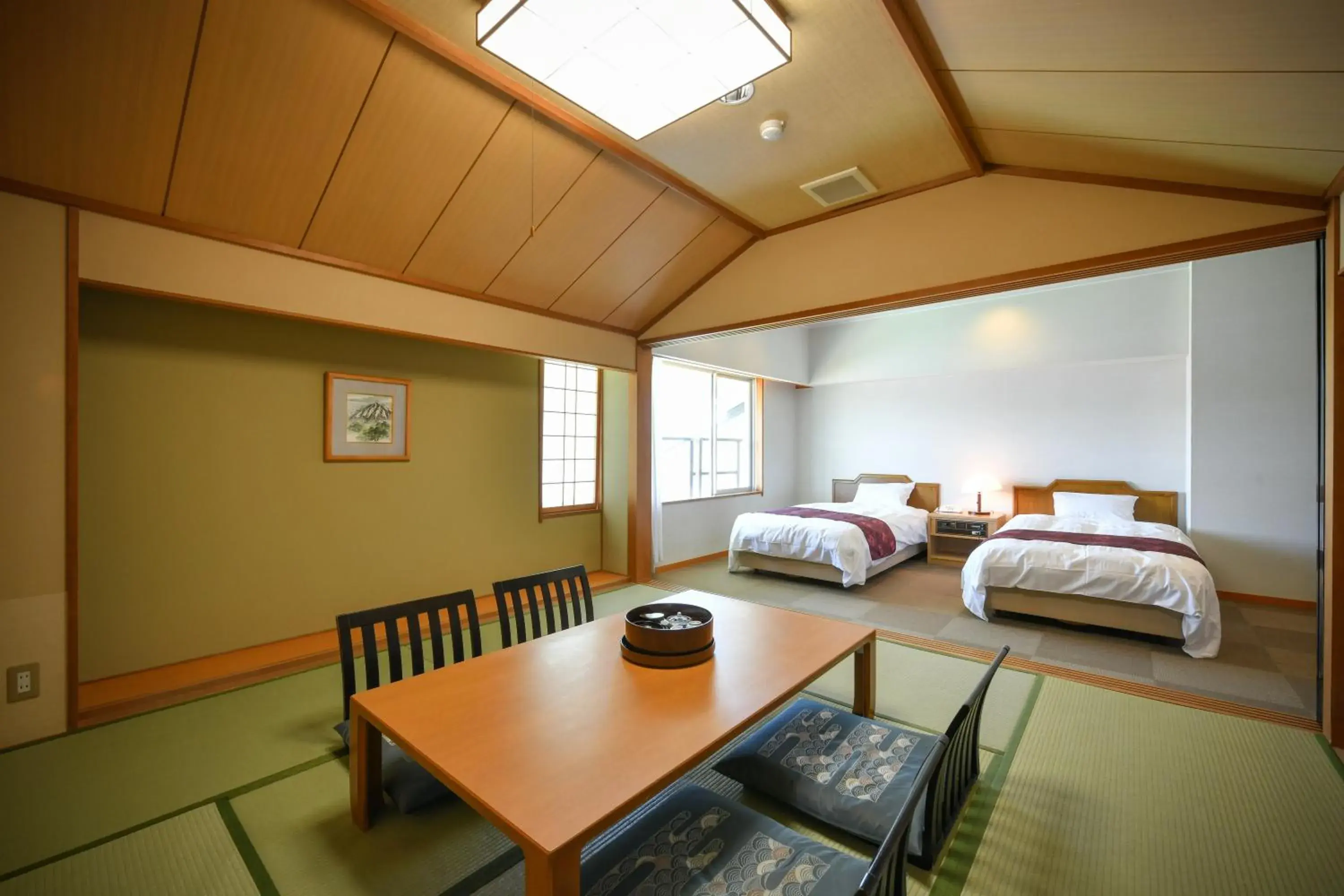 Photo of the whole room, Bed in Awara Kitagata Onsen Kohanso Hana Yurari Photo of the whole room, Bed in Awara Kitagata Onsen Kohanso Hana Yurari