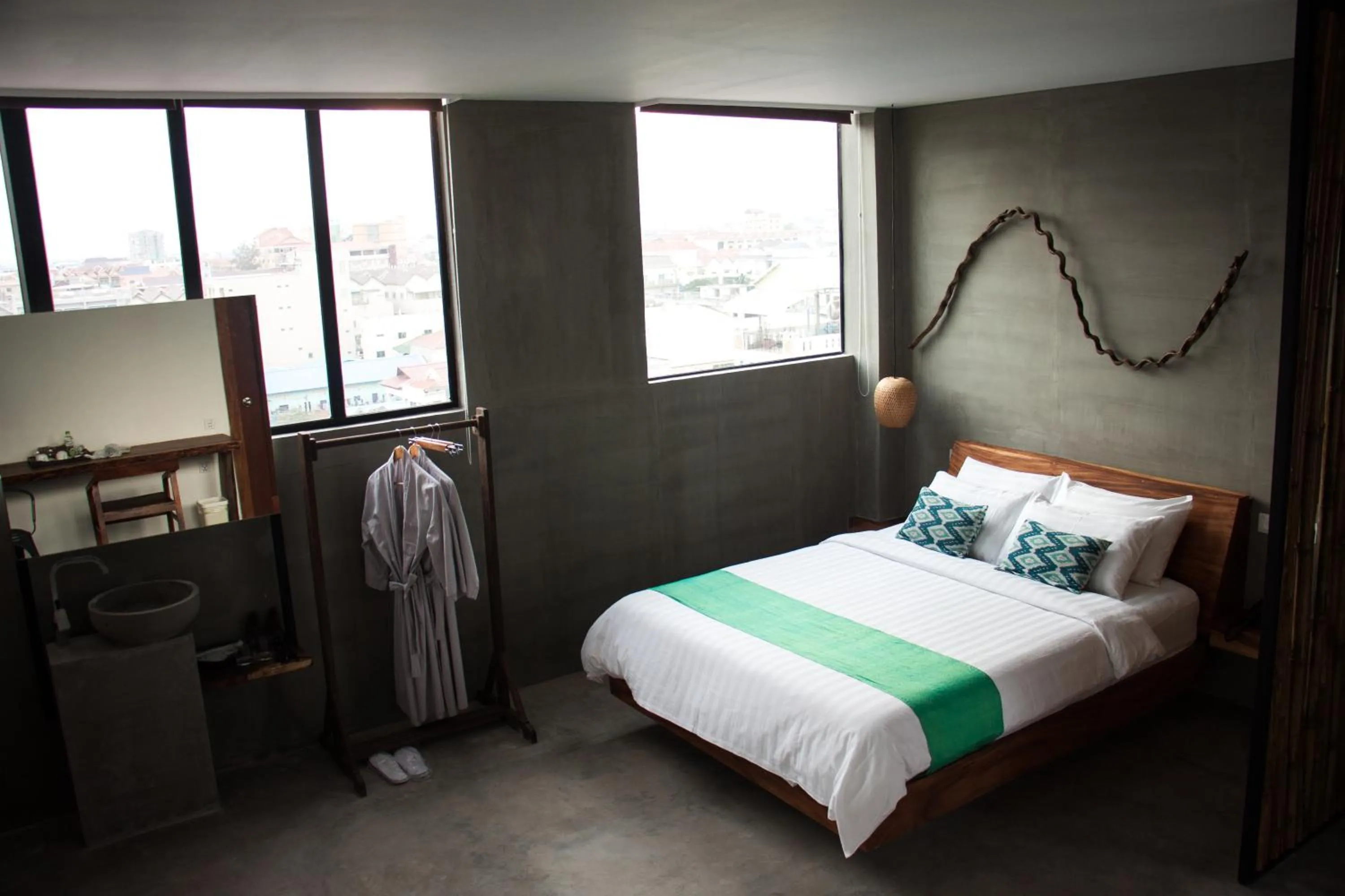 Bed in Sarina Boutique Hotel