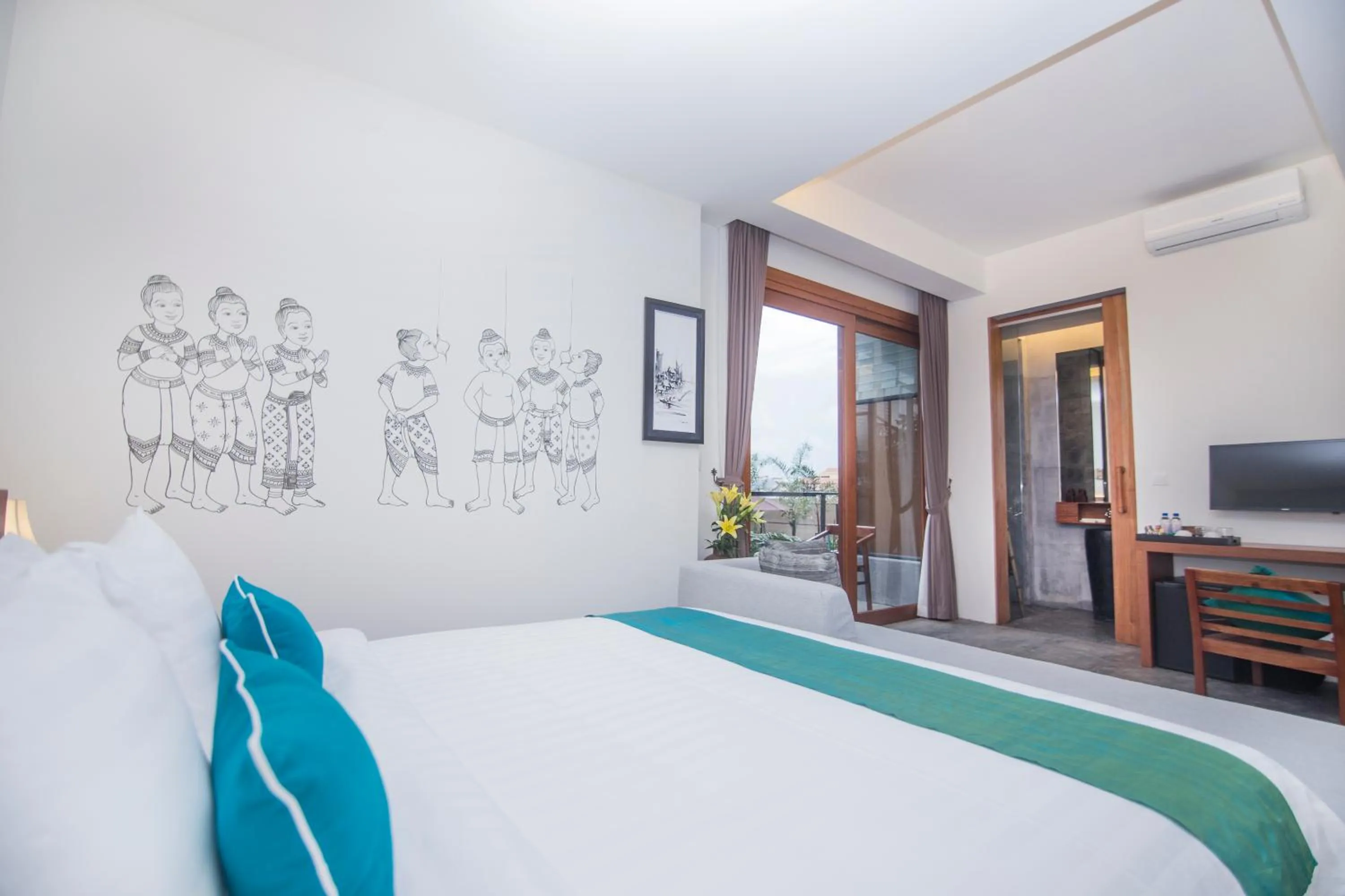 Photo of the whole room, Bed in Sarina Boutique Hotel