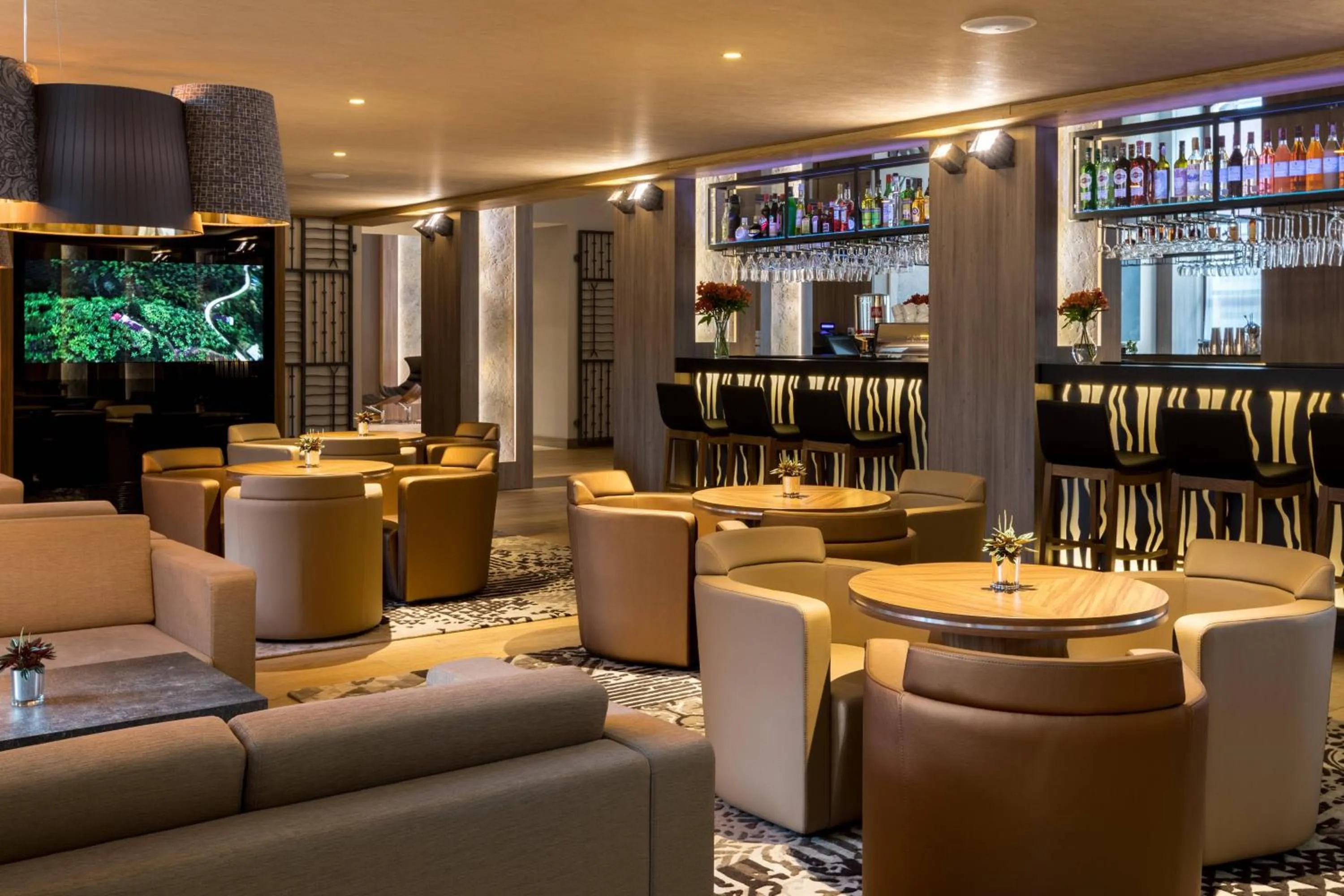 Lounge or bar in AC Hotel by Marriott Wroclaw