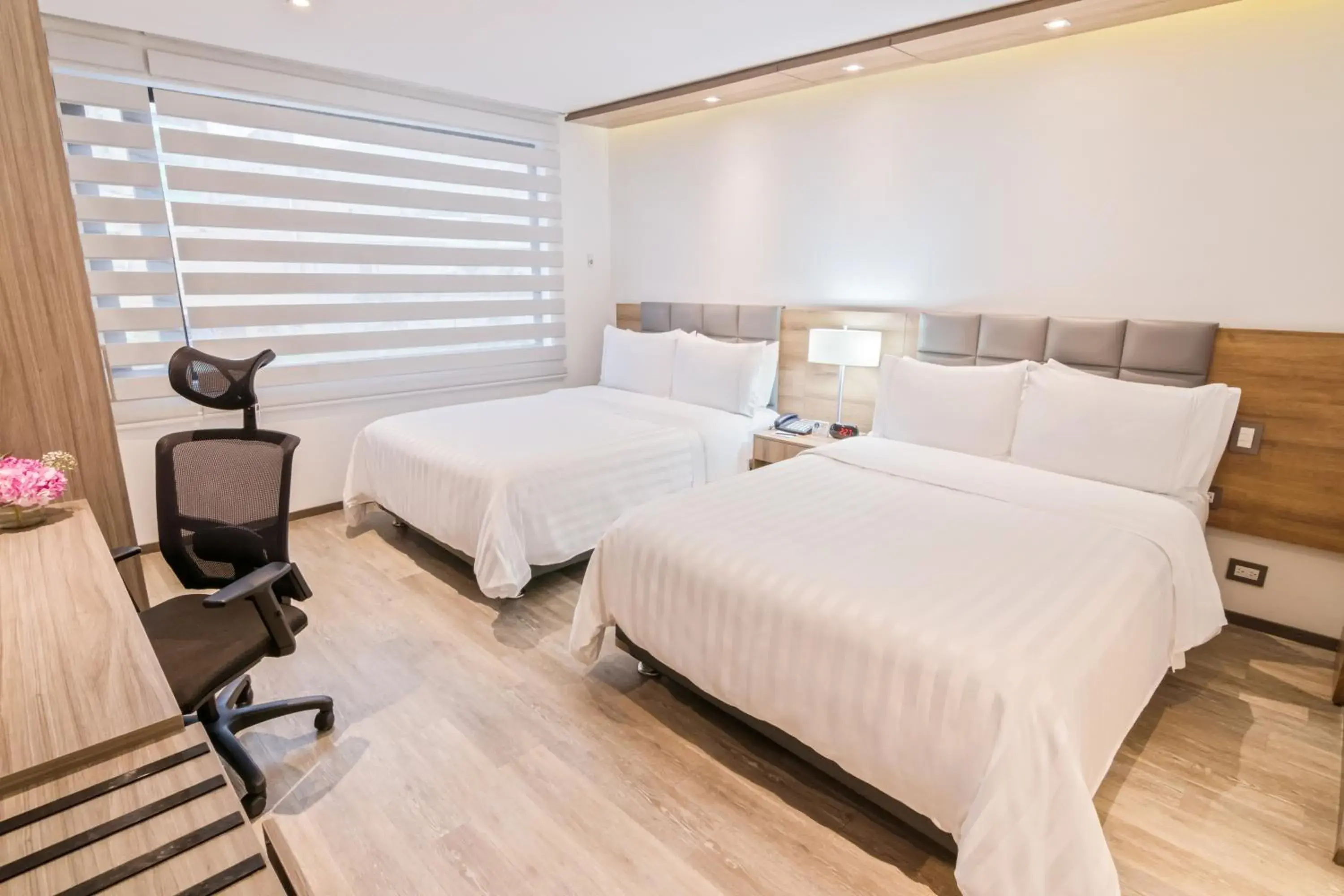 Bed in GHL Hotel Portón Medellín Bed in GHL Hotel Portón Medellín