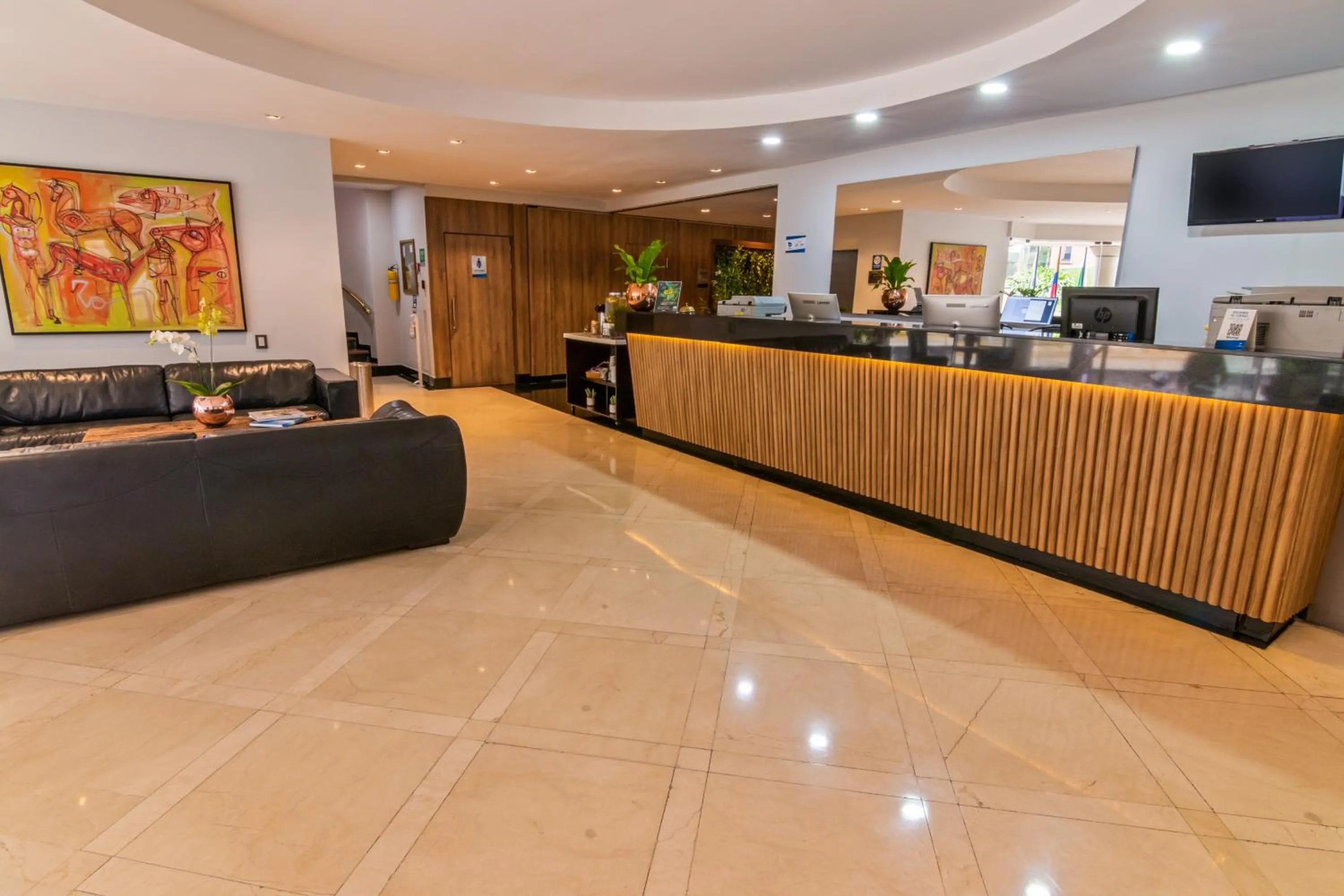 Lobby or reception in GHL Hotel Portón Medellín