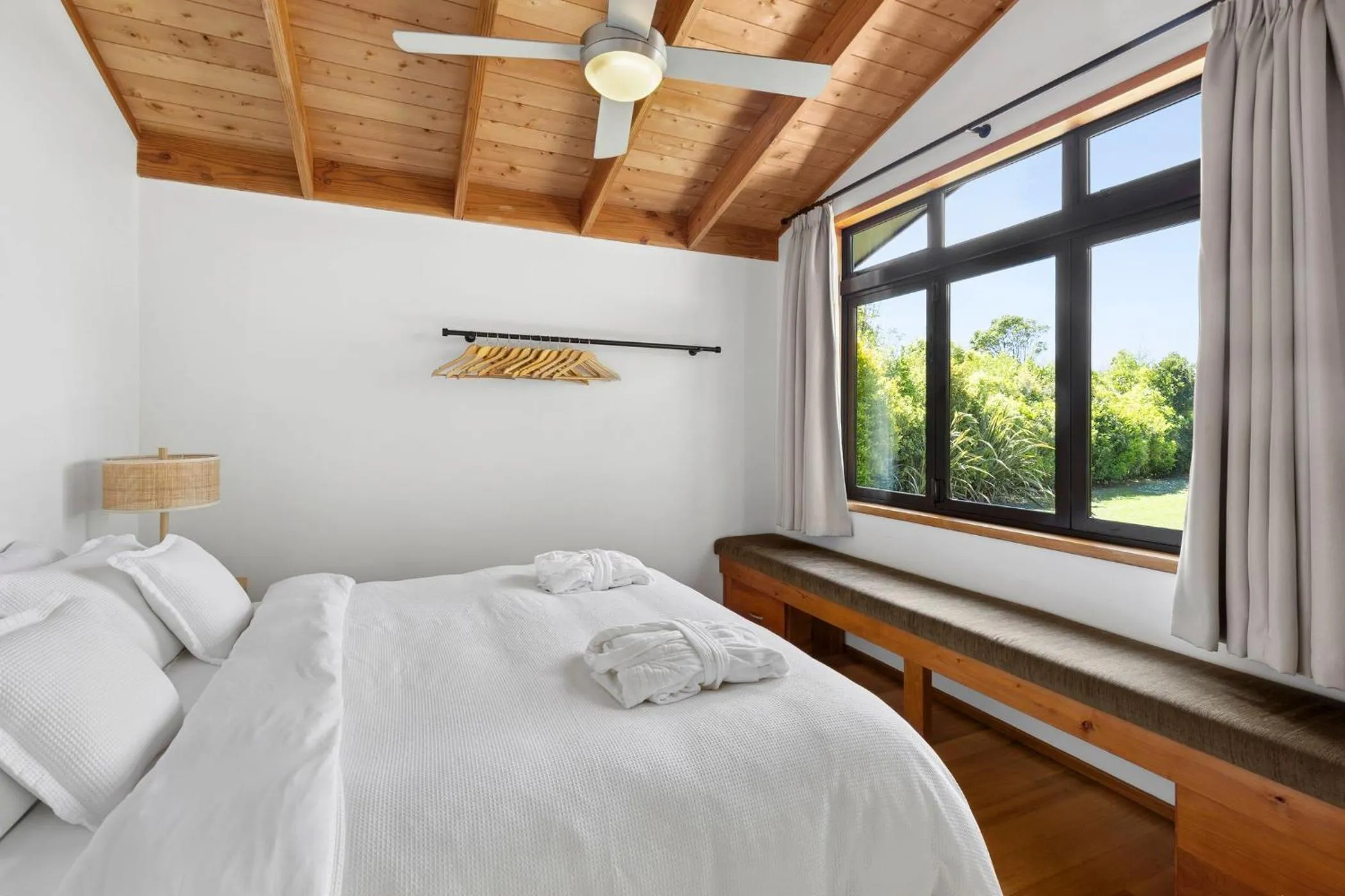 Bed in Adrift In Golden Bay- Absolute Beachfront Villas