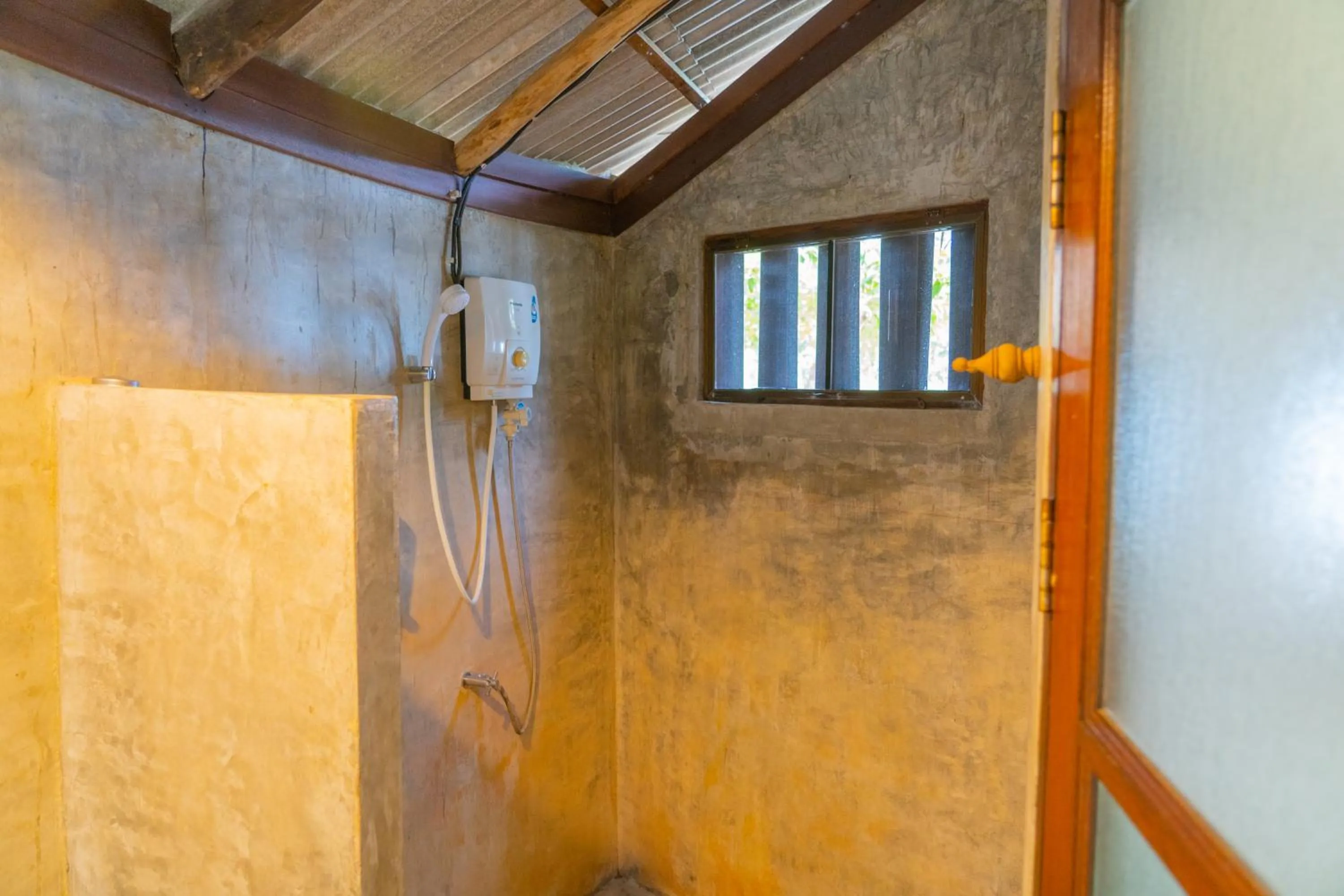 Bathroom in The Tropical Beach Resort