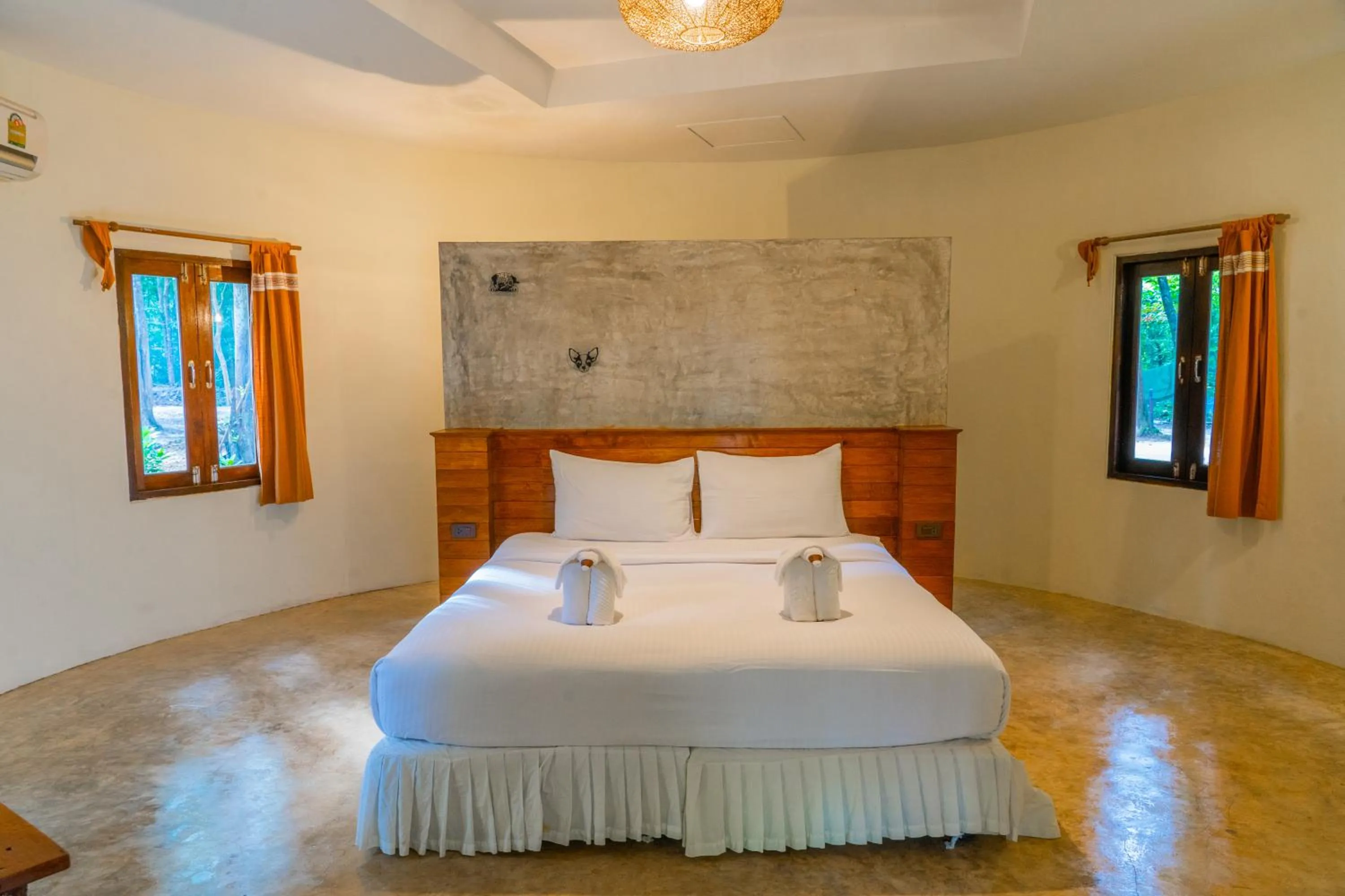 Bed in The Tropical Beach Resort