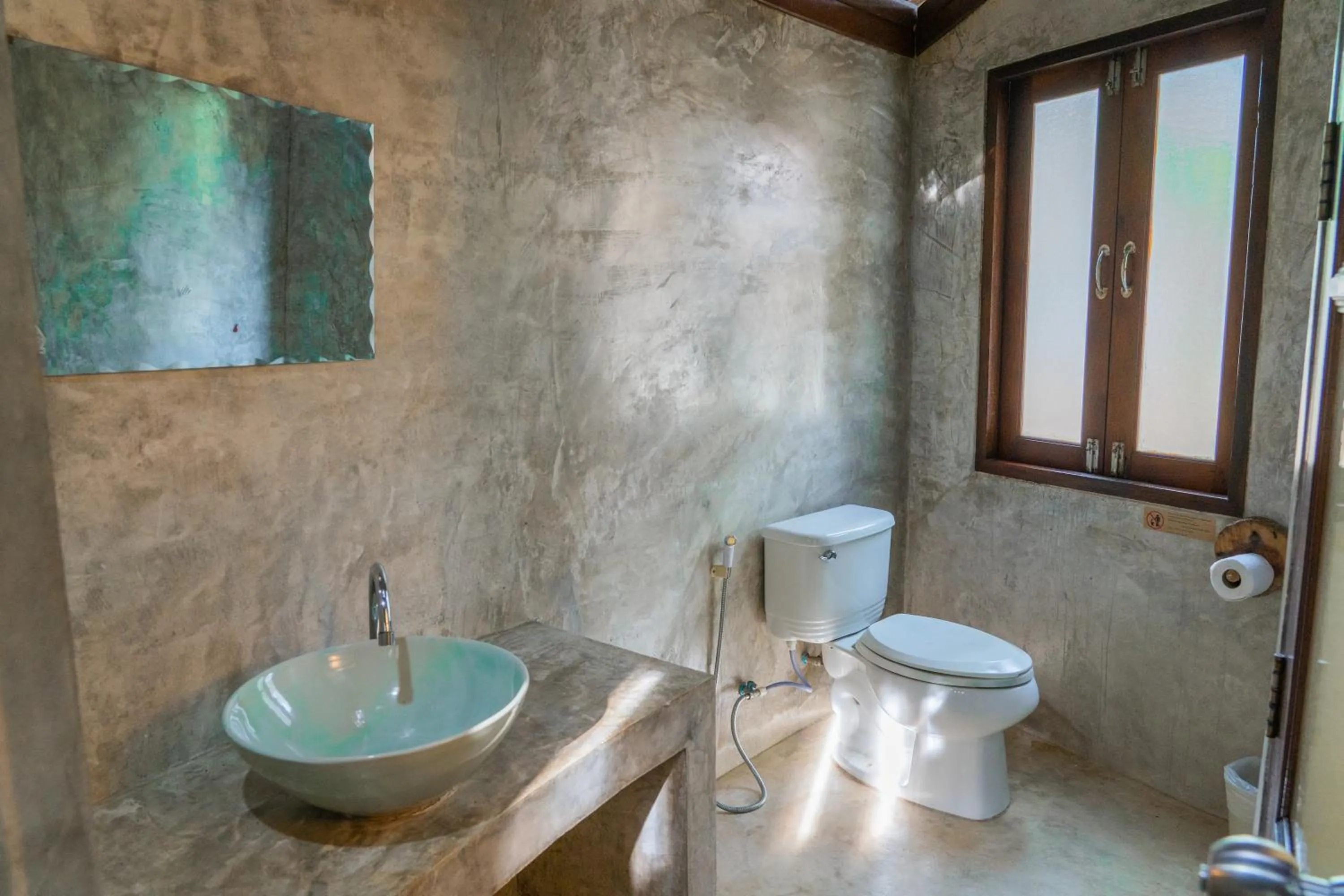 Toilet in The Tropical Beach Resort