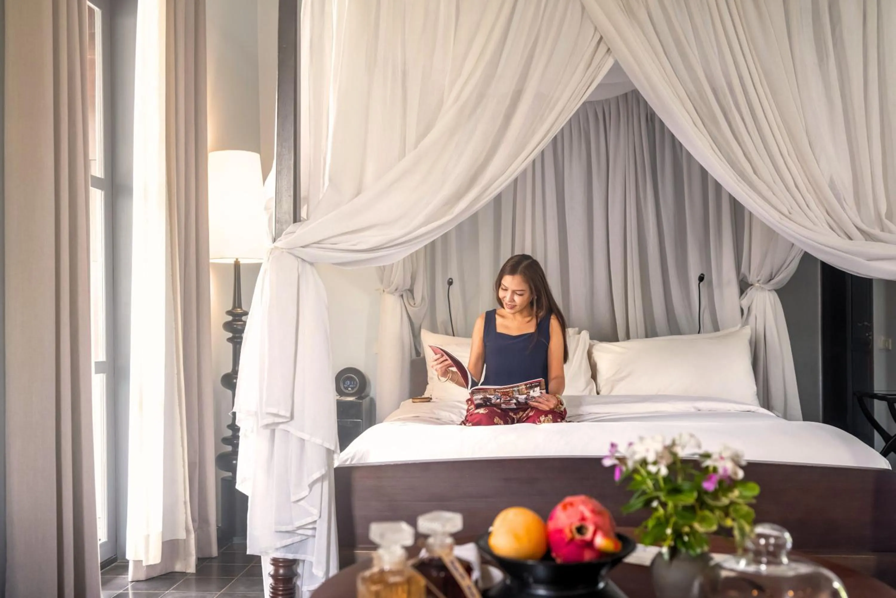 Photo of the whole room, Bed in Sofitel Luang Prabang