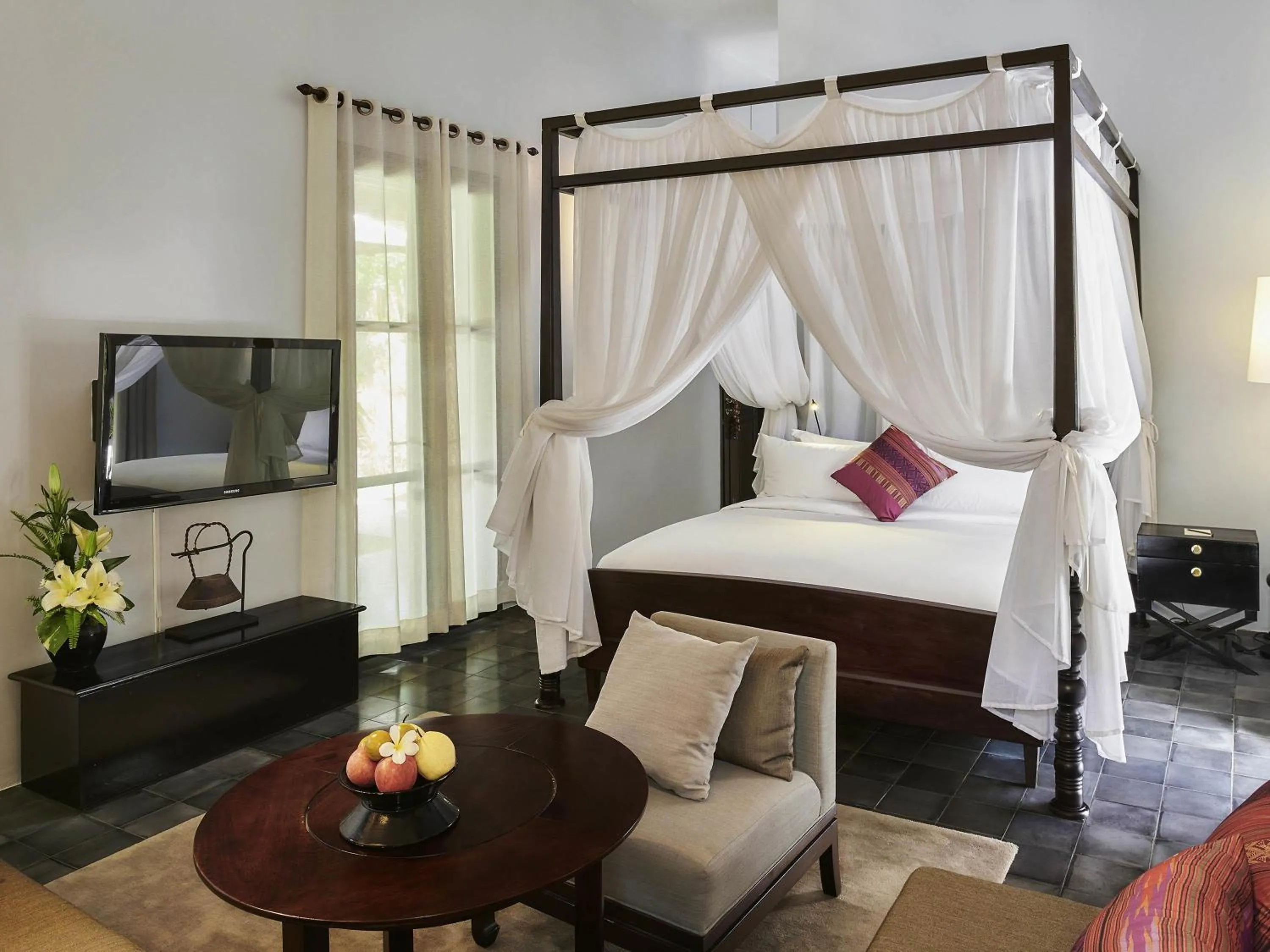 Photo of the whole room, Bed in Sofitel Luang Prabang