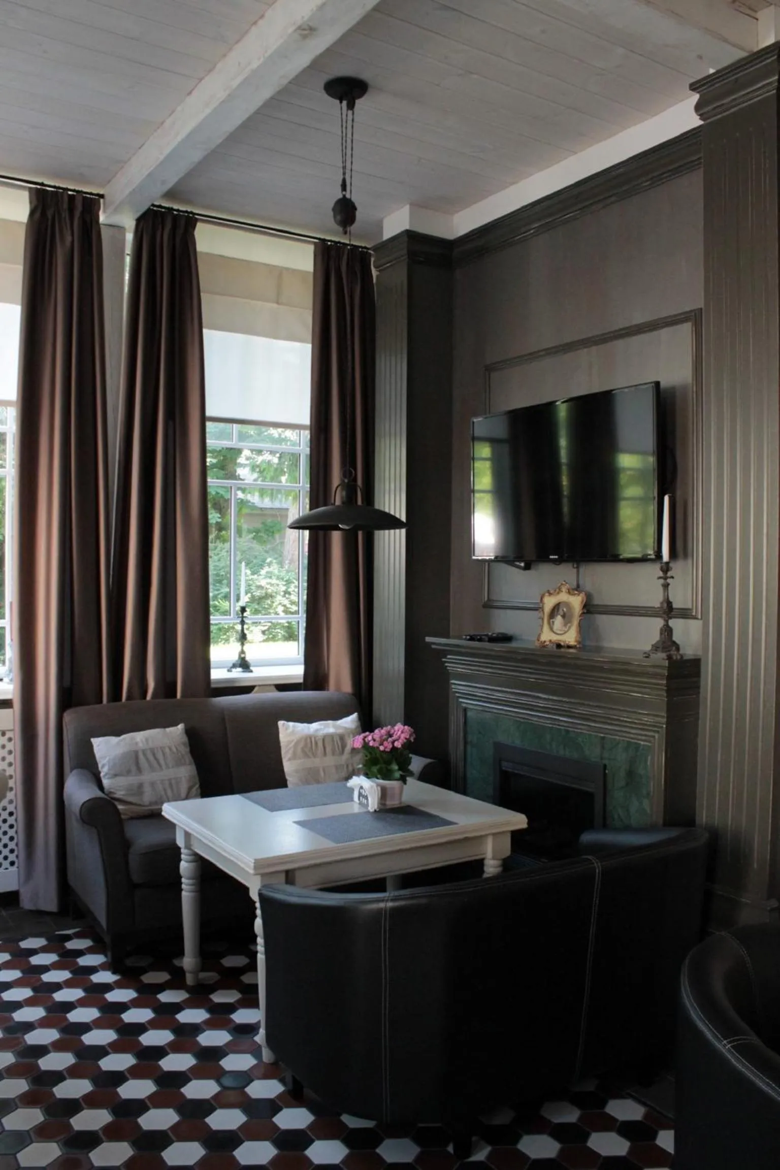 Communal lounge/ TV room in Villa Joma