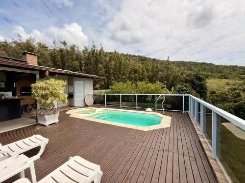 Casa de temporada com piscina