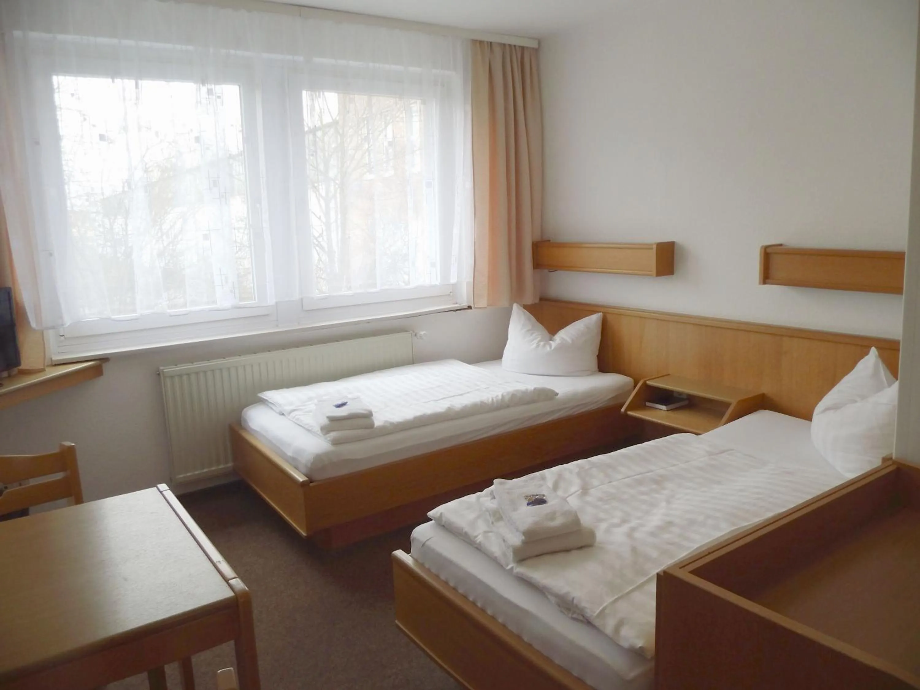 Photo of the whole room, Bed in Hotel Sturm