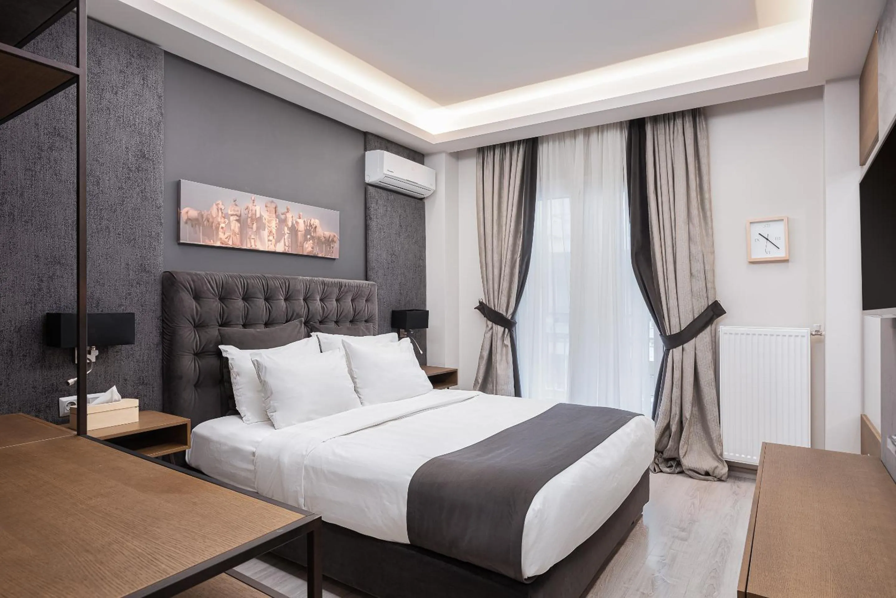 Bed in Acropolis Elegant Apartment