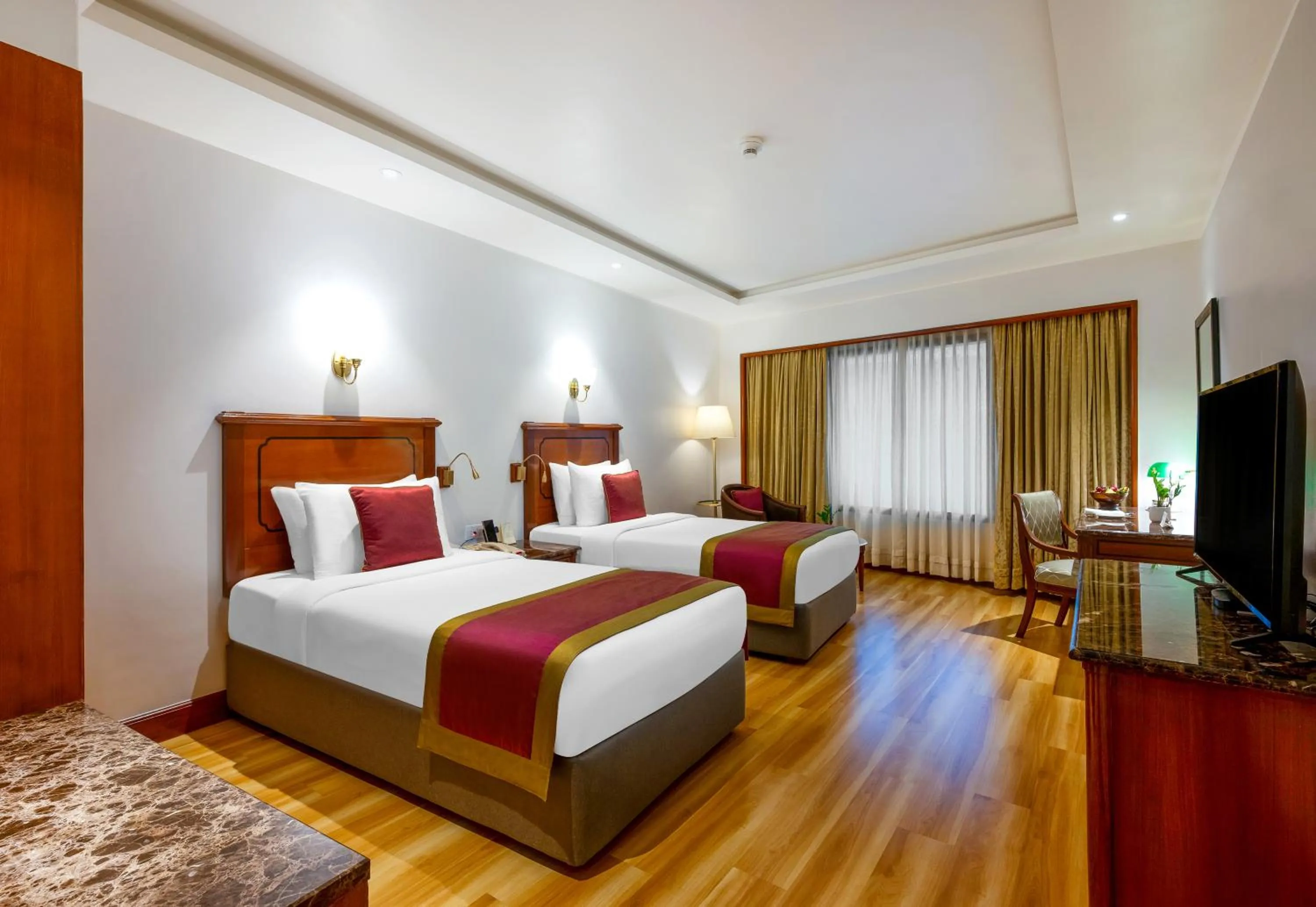 Bed in The Orchid Hotel Mumbai Vile Parle