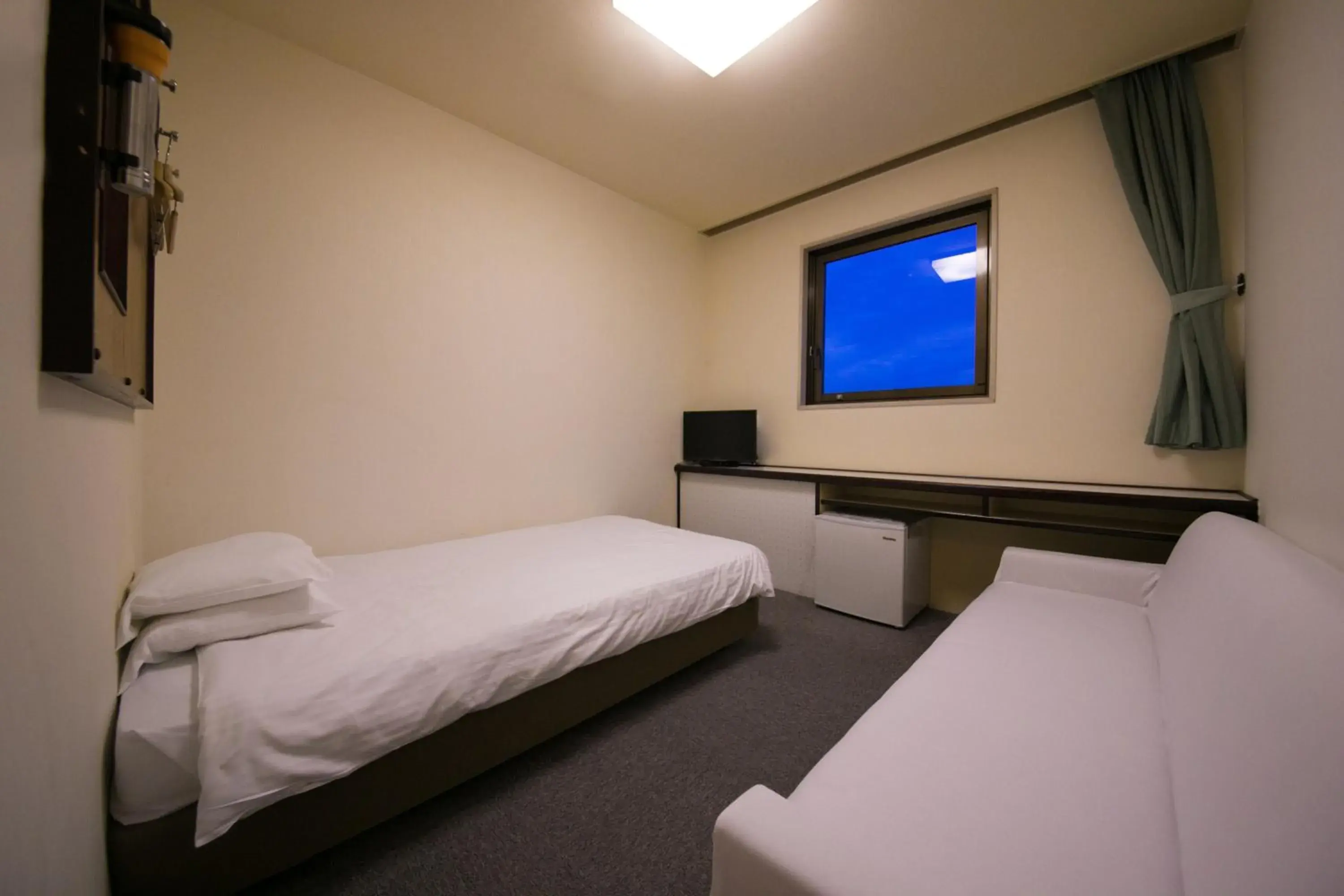 Bed in Heiwadai Hotel Otemon Bed in Heiwadai Hotel Otemon