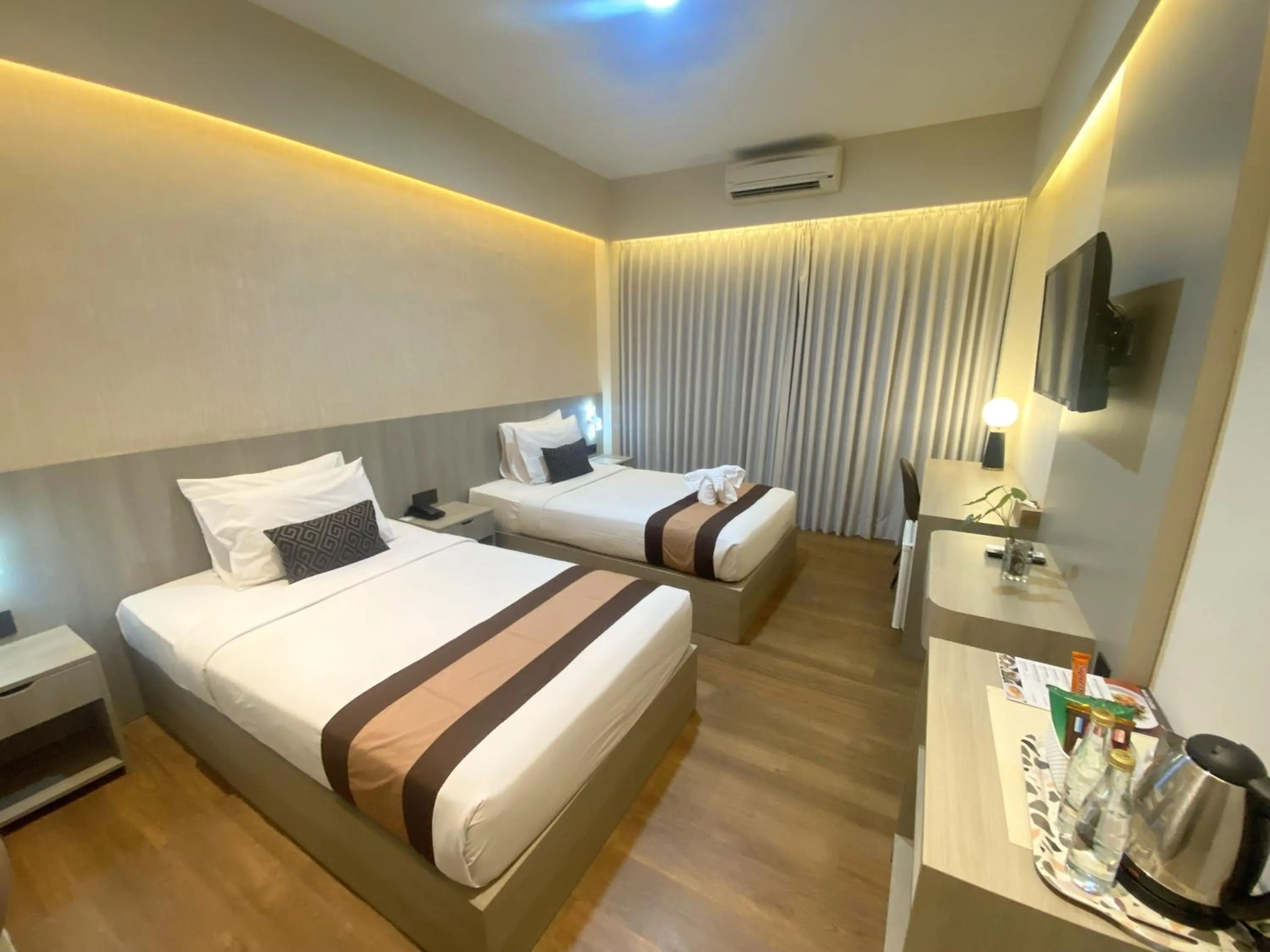 Bed in Grand Santhi Hotel