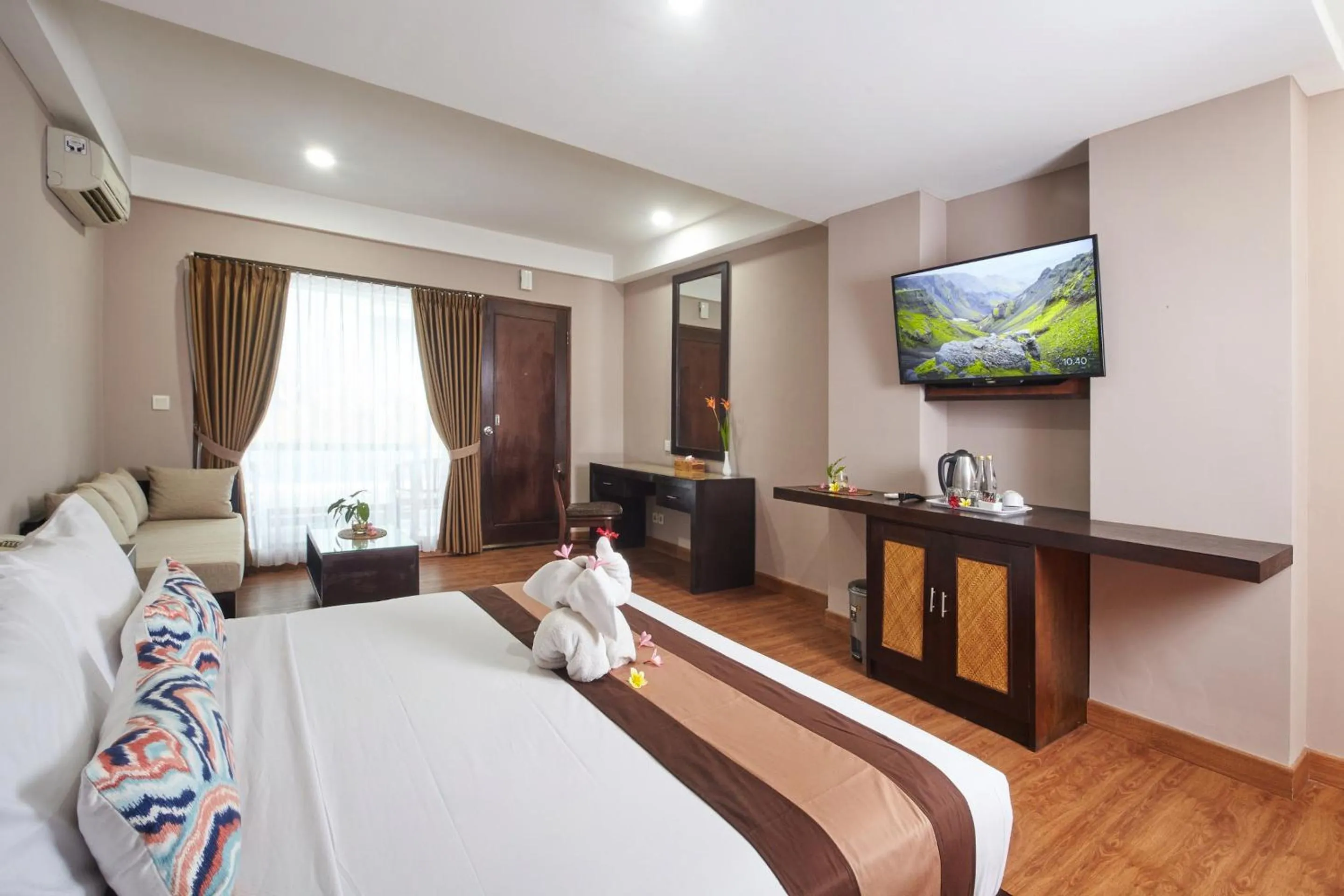 Bedroom, Bed in Grand Santhi Hotel