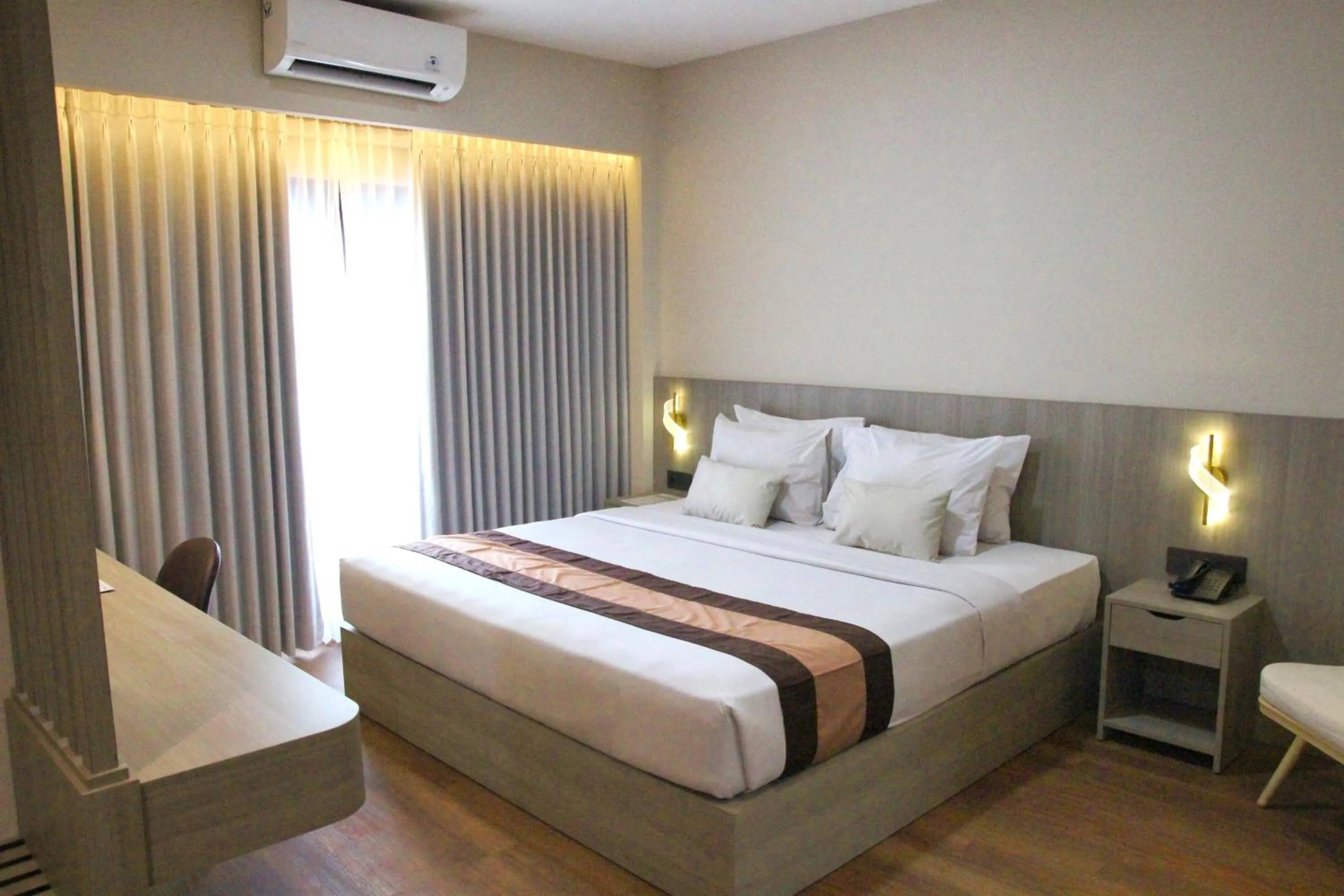 Bedroom, Bed in Grand Santhi Hotel