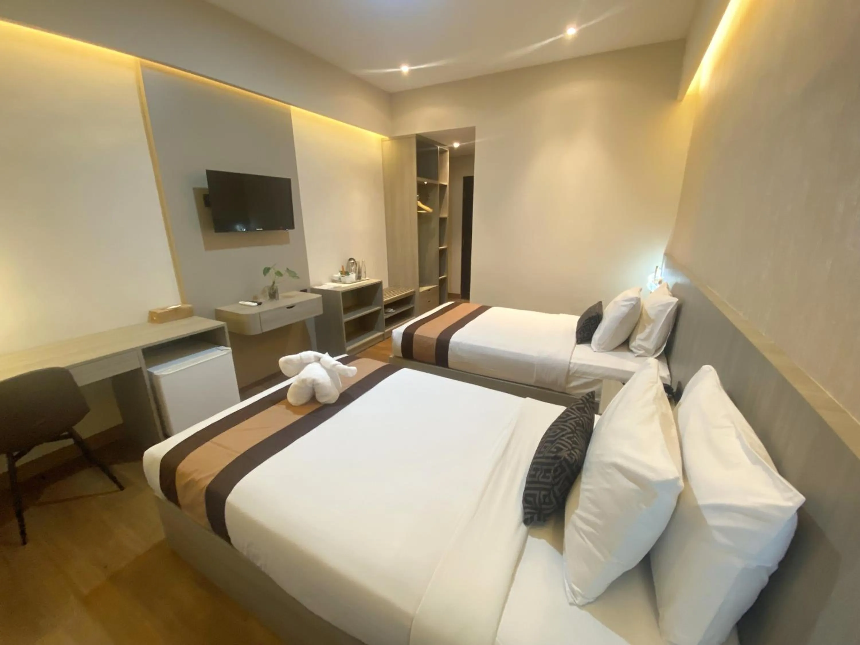 Bed in Grand Santhi Hotel