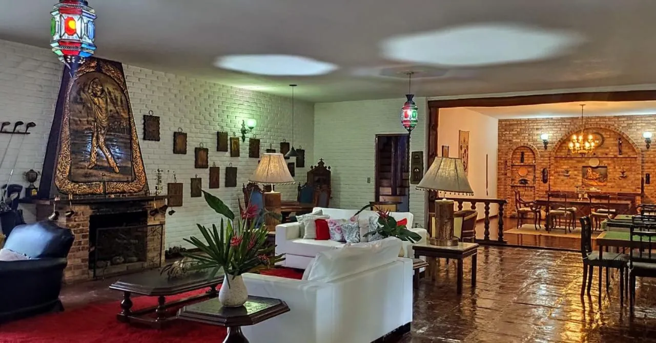 Communal lounge/ TV room in Pousada Taverna do Golf