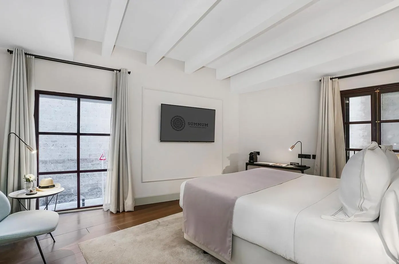 Bed in Summum Boutique Hotel, member of Meliá Collection