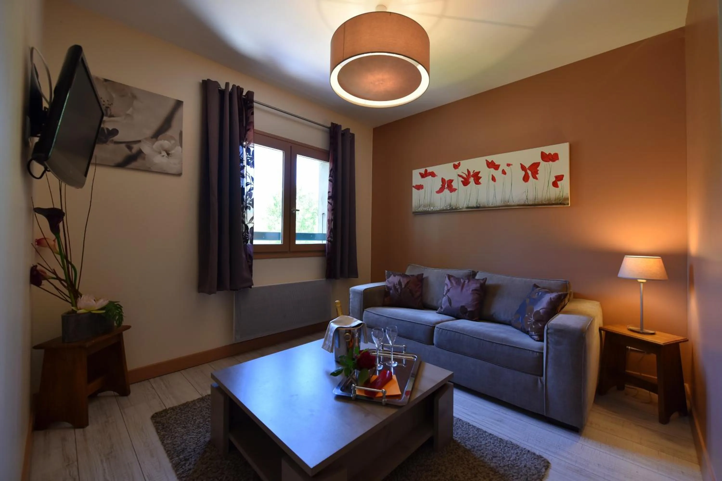 Photo of the whole room in Logis Hôtel Restaurant Le Castel Fleuri