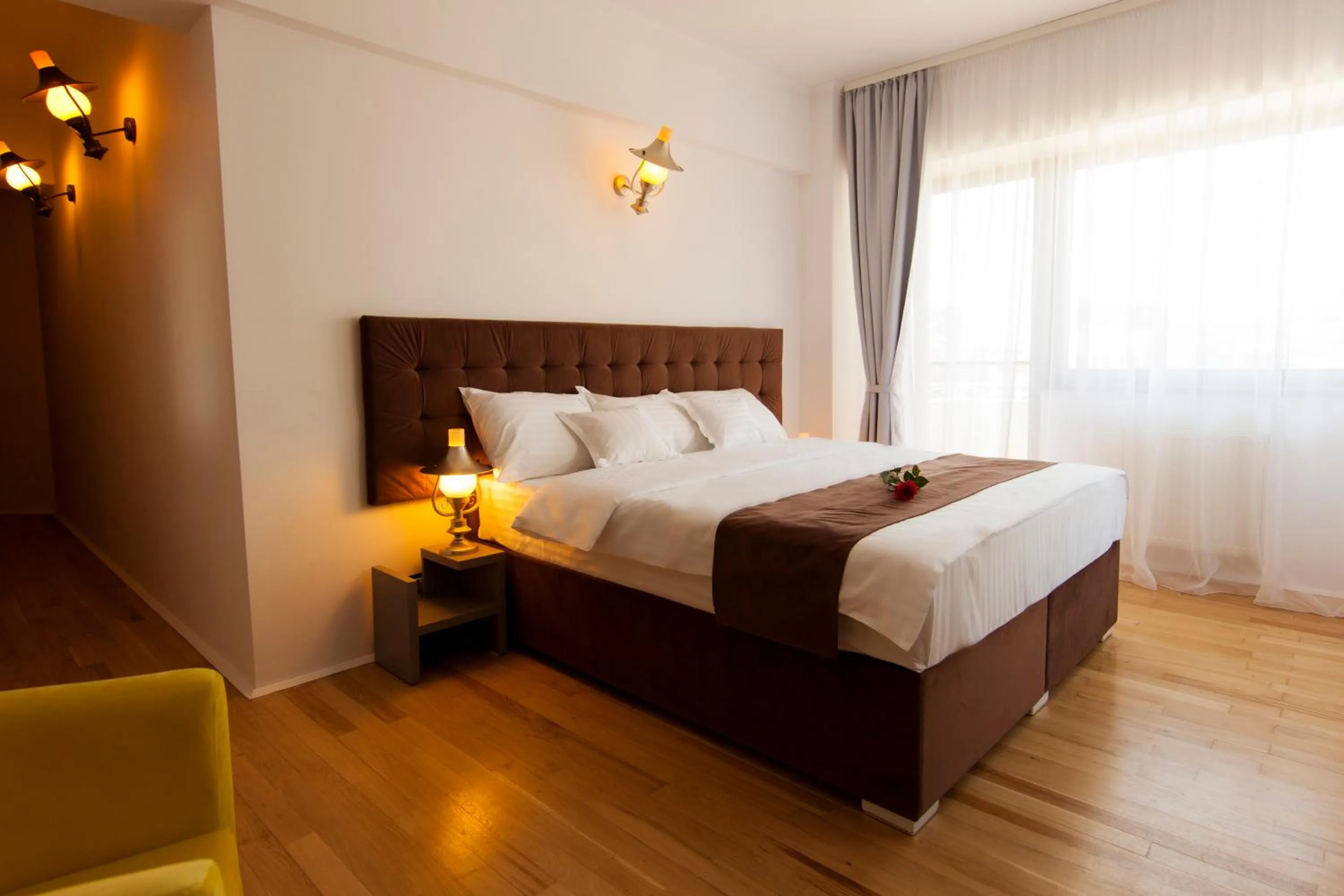 Bed in Ambra Boutique Hotel & Bistro