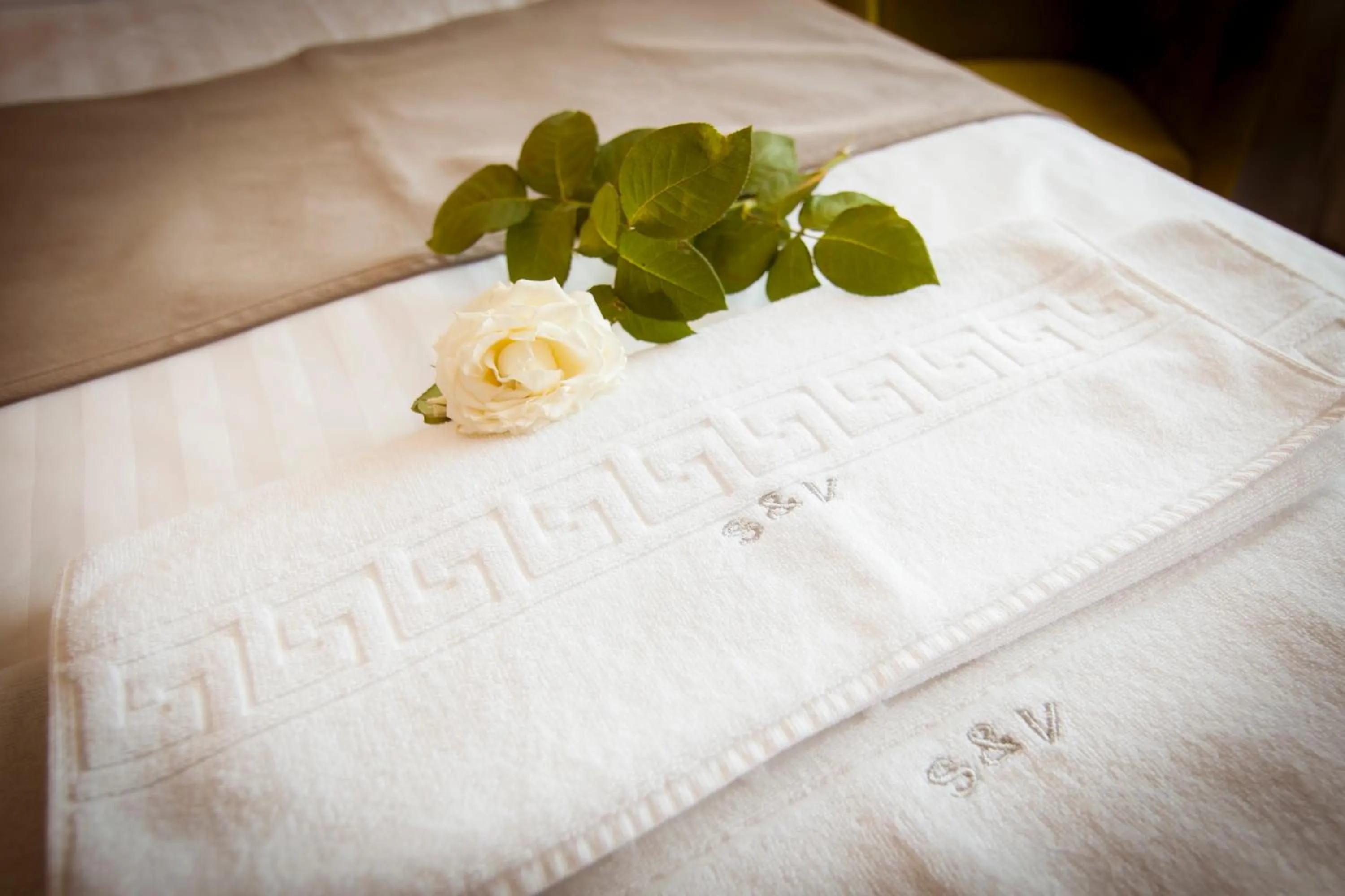 Bed in Ambra Boutique Hotel & Bistro