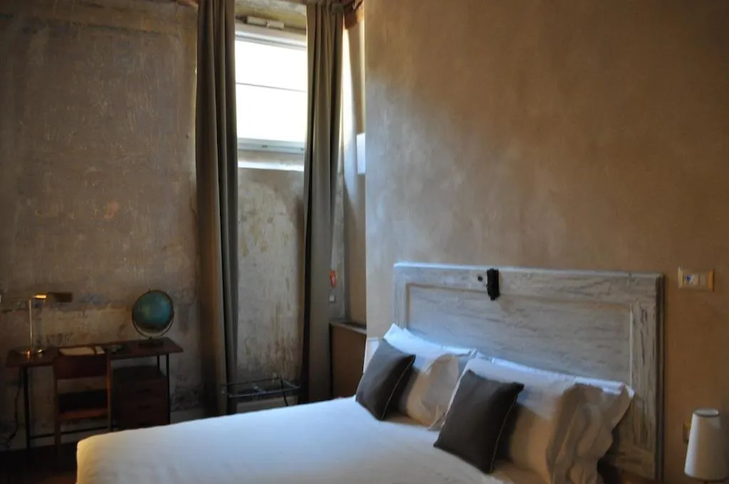 Bed in Residenza La Musa Amarcord