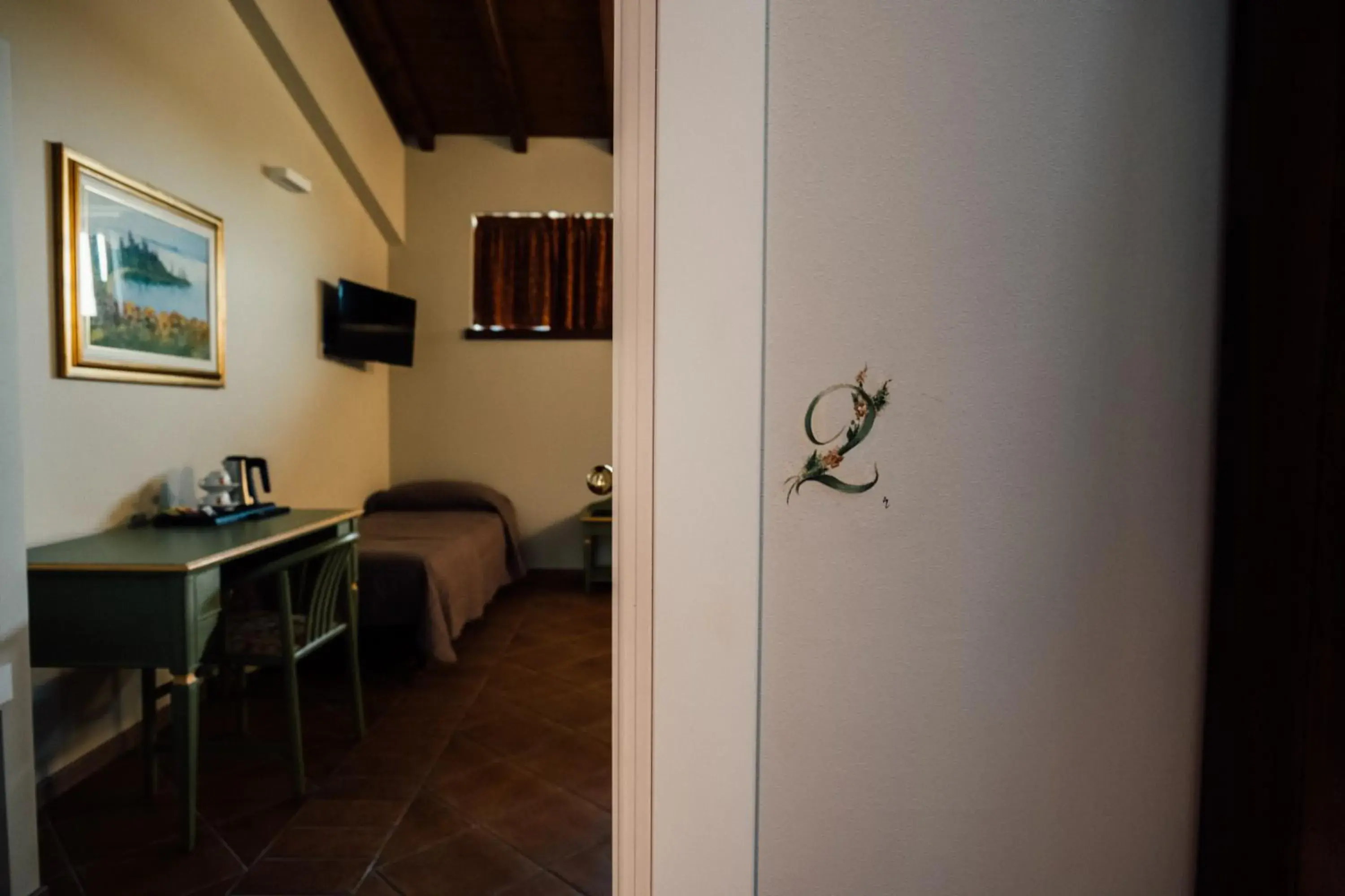 Triple Room in Albergo La Meridiana Triple Room in Albergo La Meridiana