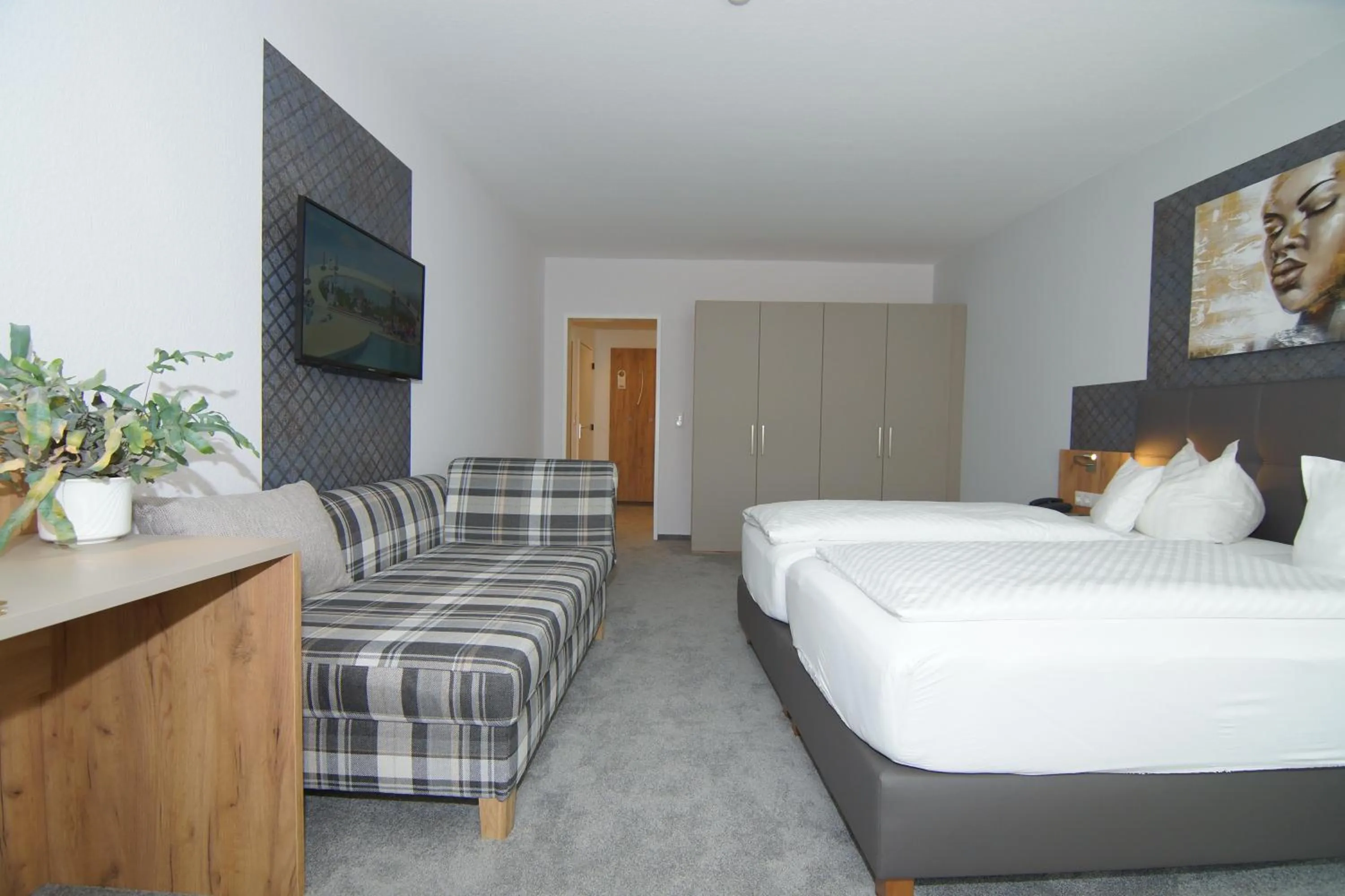 Photo of the whole room, Bed in Komforthotel & Restaurant Riemann
