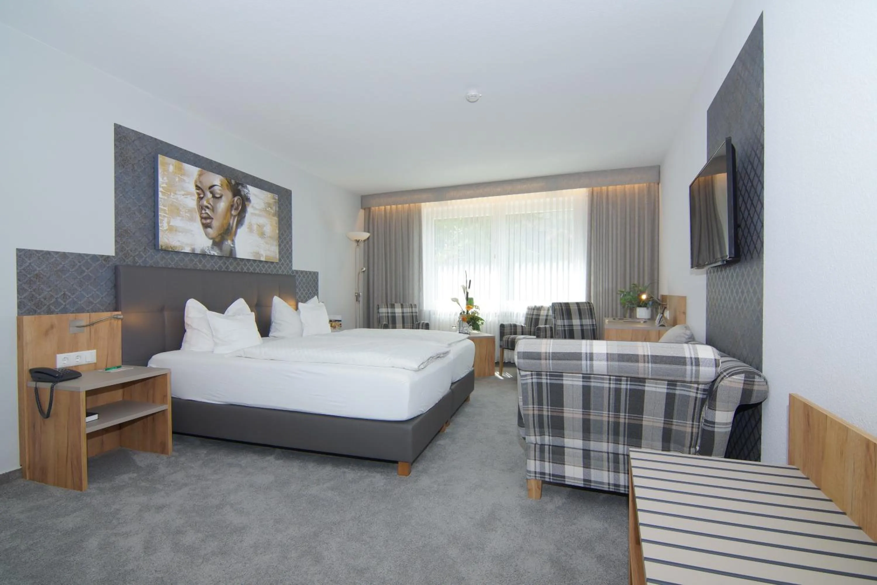 Photo of the whole room, Bed in Komforthotel & Restaurant Riemann