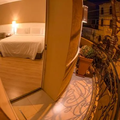 Balcony/Terrace, Bed in Planalto Select Hotel Ponta Grossa