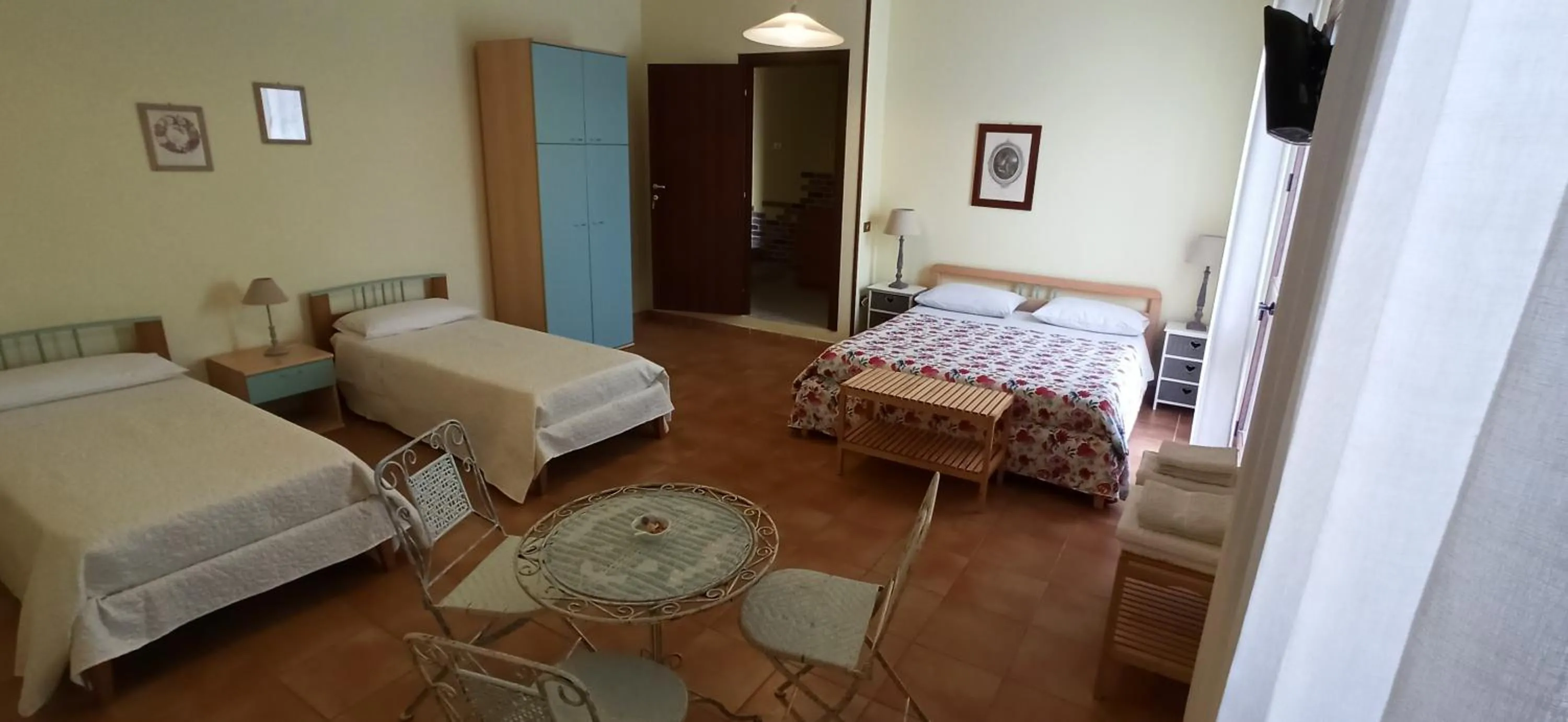 Quadruple Room with Private Bathroom in B&B Casa Piras IUN3880