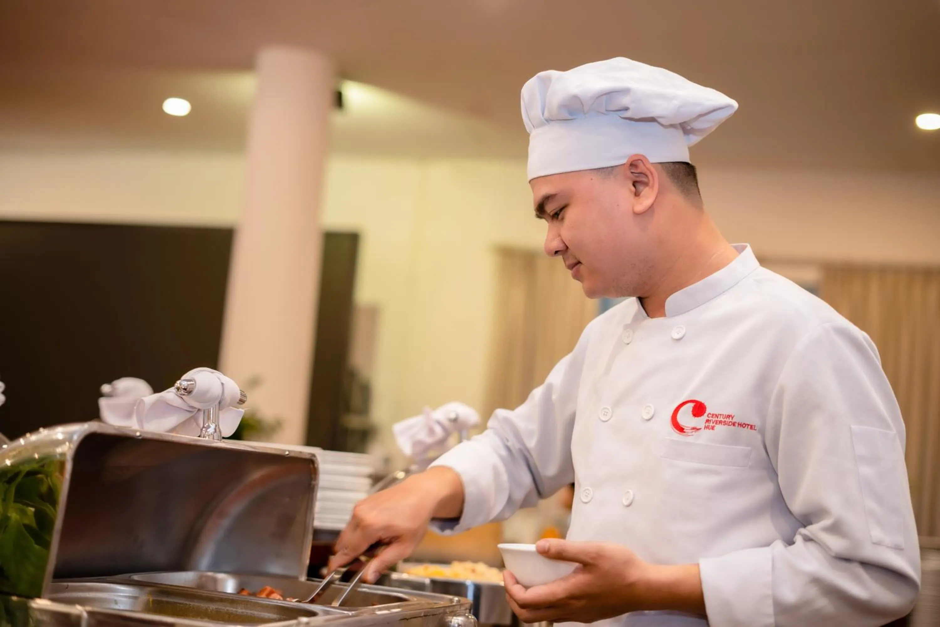 Staff in Century Riverside Hotel Hue