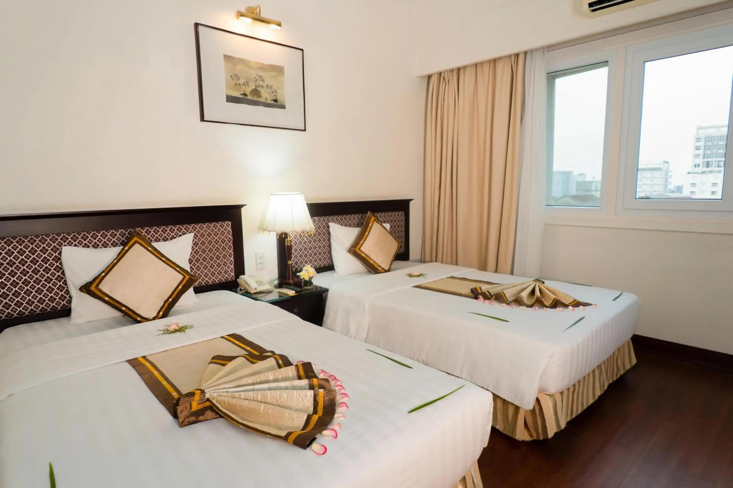 Deluxe Twin Room with Garden View in Century Riverside Hotel Hue Deluxe Twin Room with Garden View in Century Riverside Hotel Hue