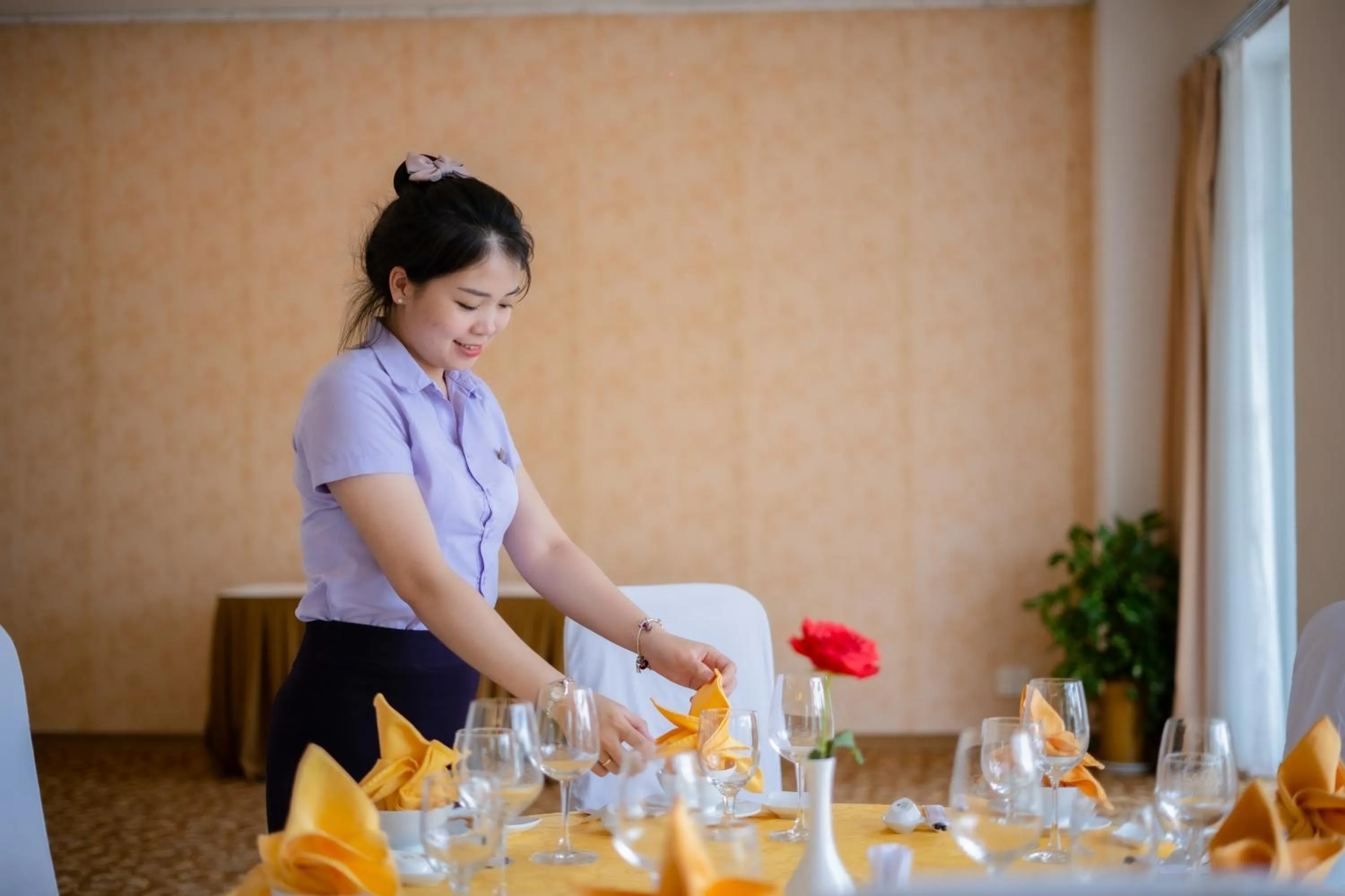 Staff in Century Riverside Hotel Hue