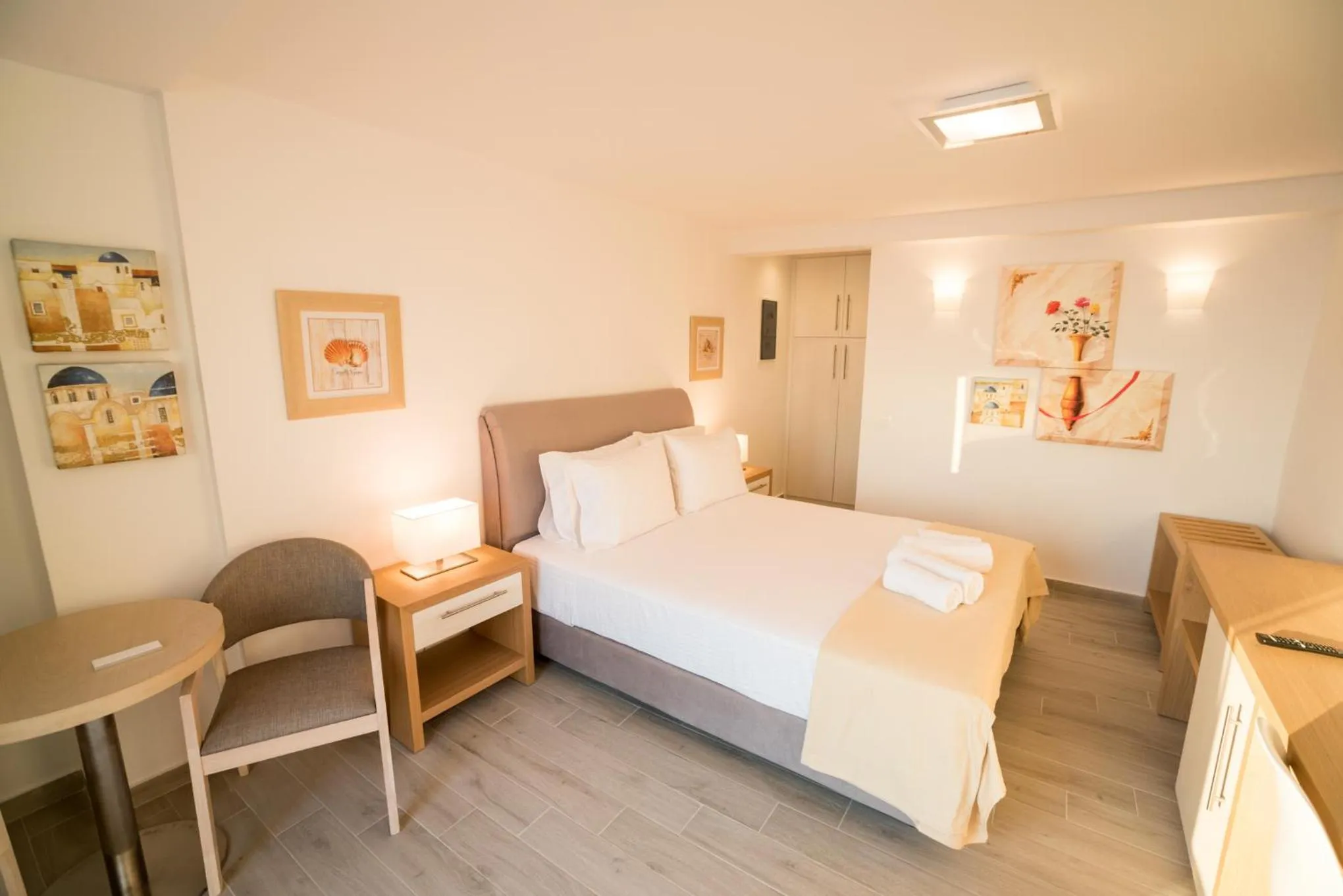 Seating area, Bed in Kratiras View Luxury Suites