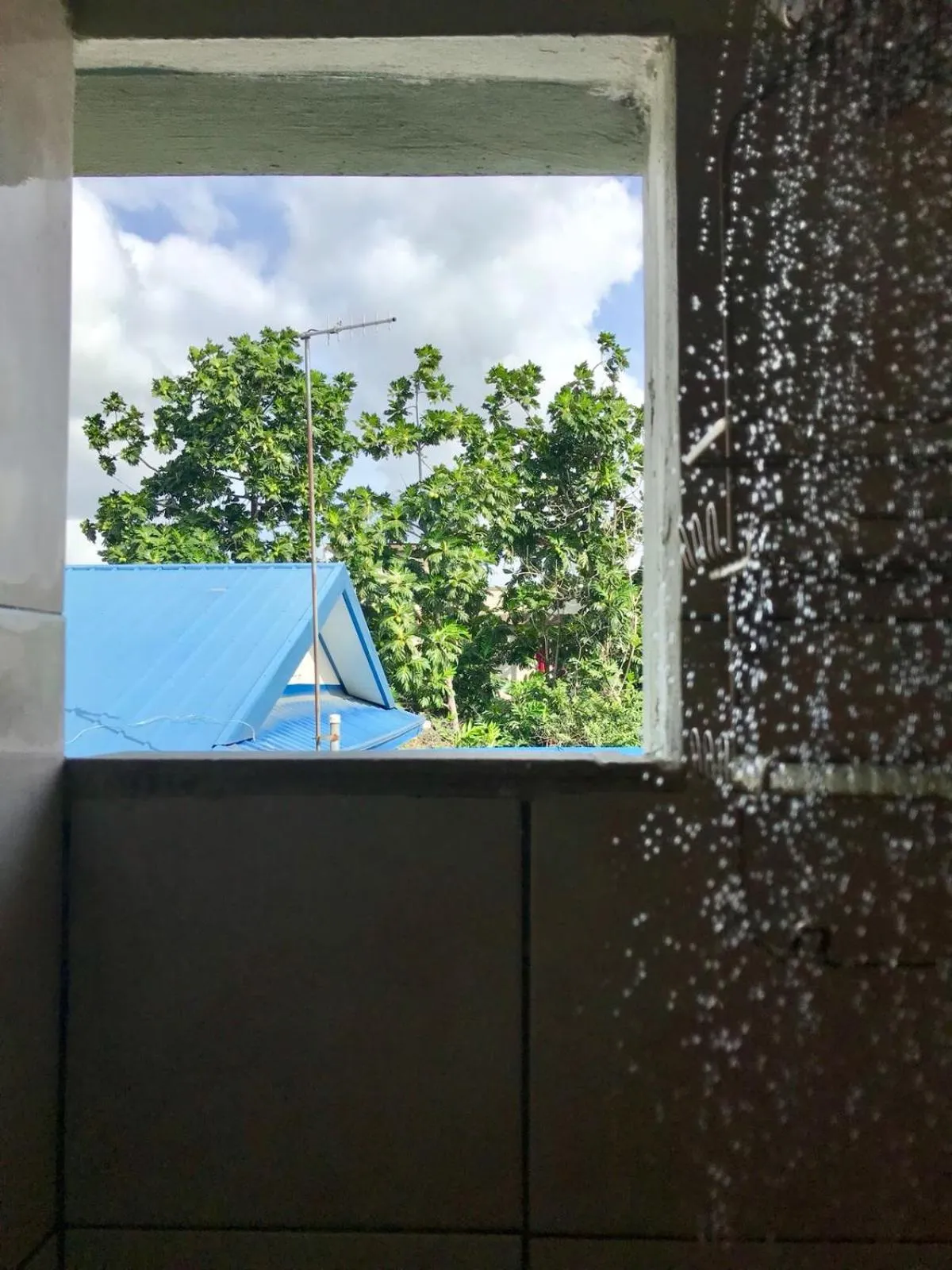 Shower in Woodbrook on the Avenue