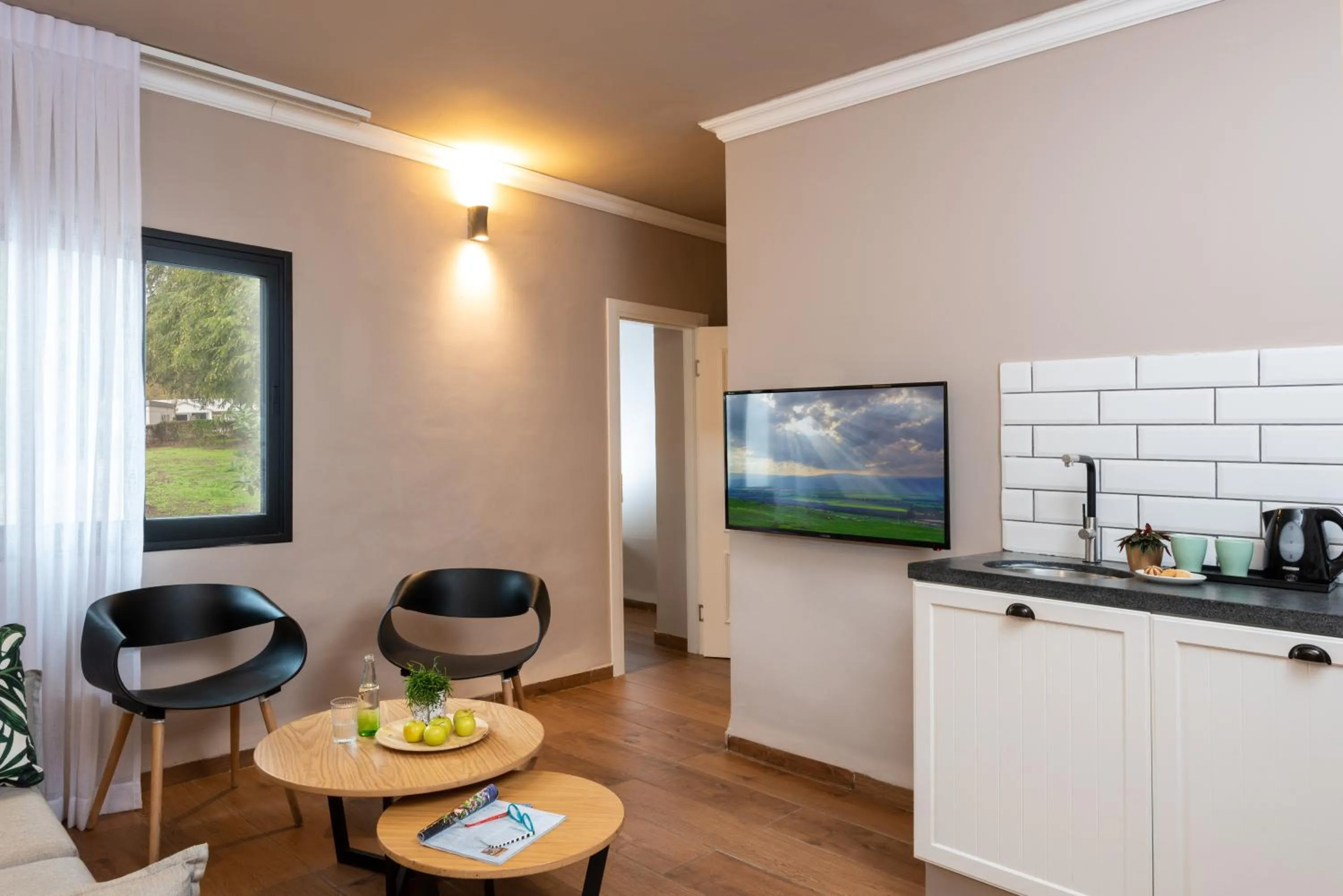 Kitchen or kitchenette in Erettz Dafna Travel Hotel