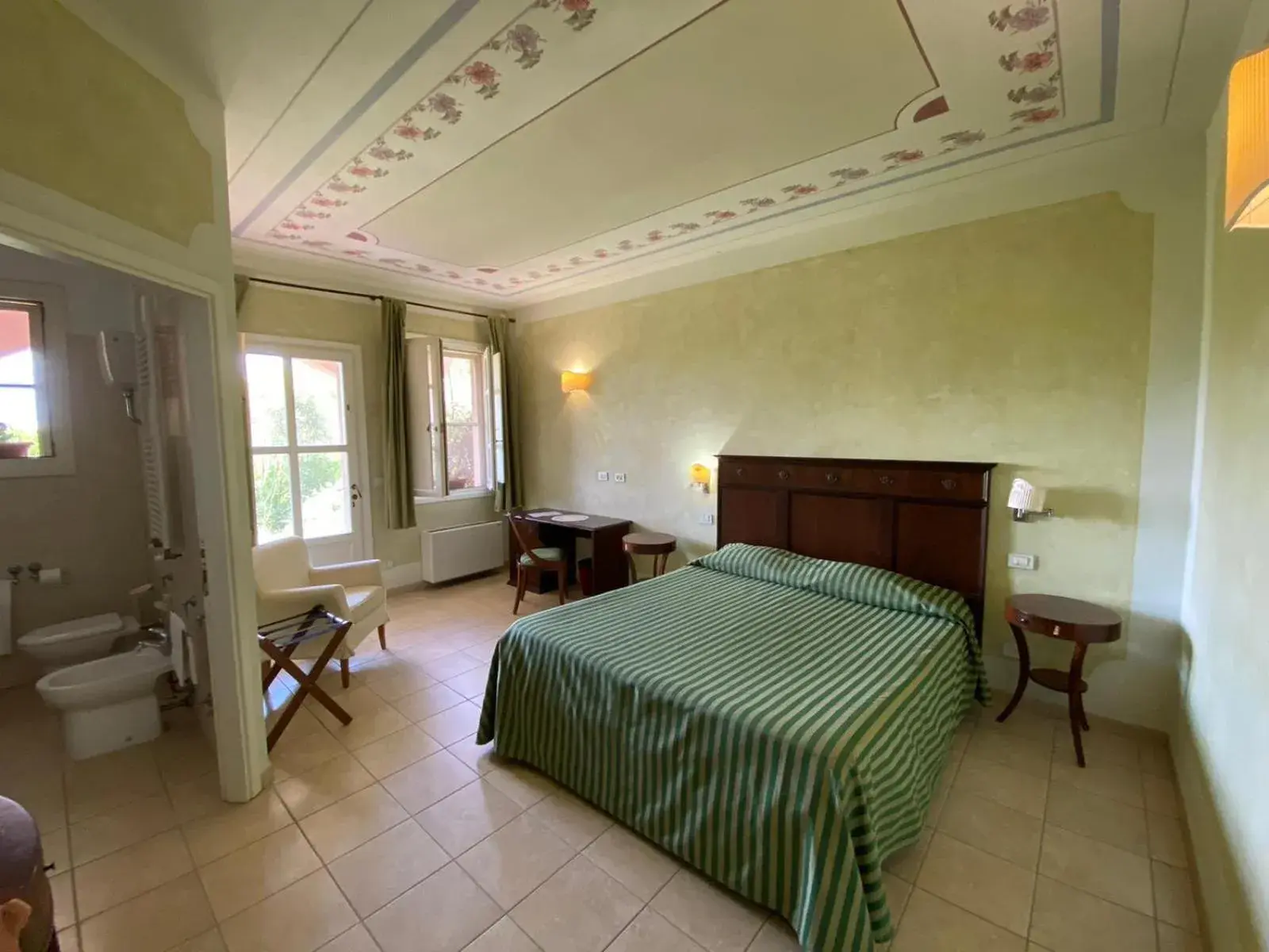 Photo of the whole room, Bed in Il Melograno Country House Photo of the whole room, Bed in Il Melograno Country House