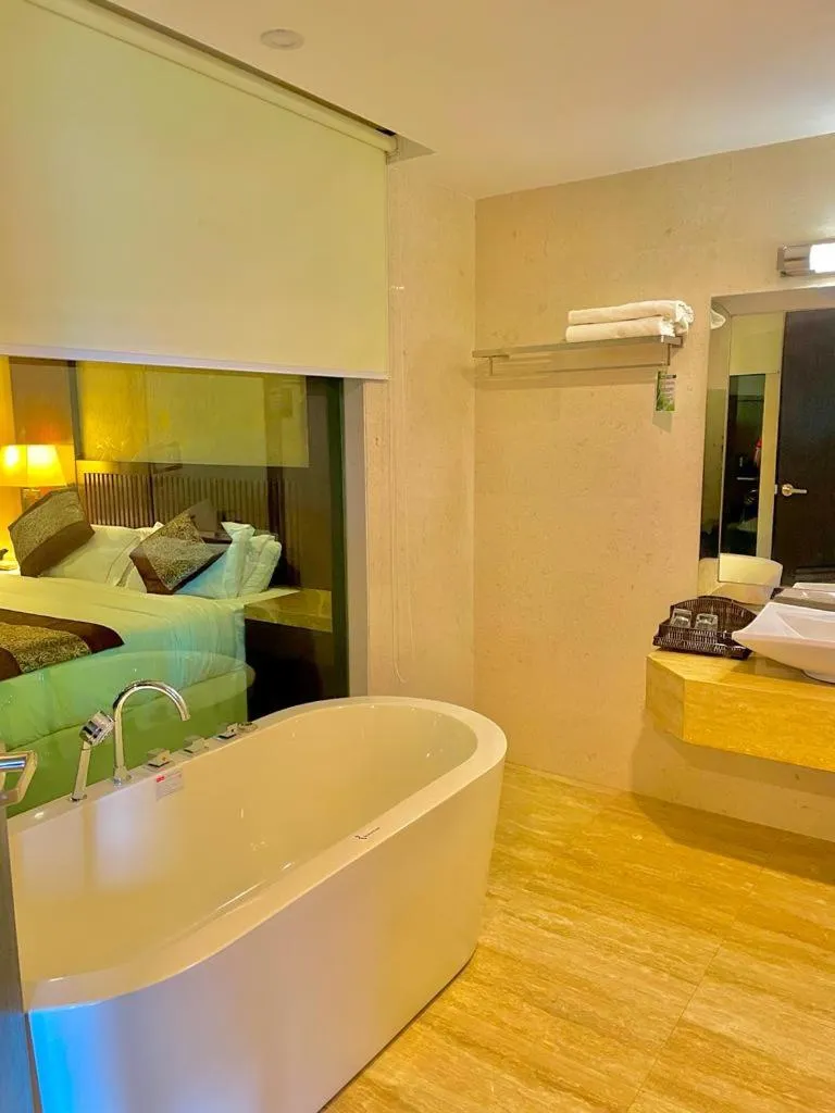 Bed in Royale Signature Hotel