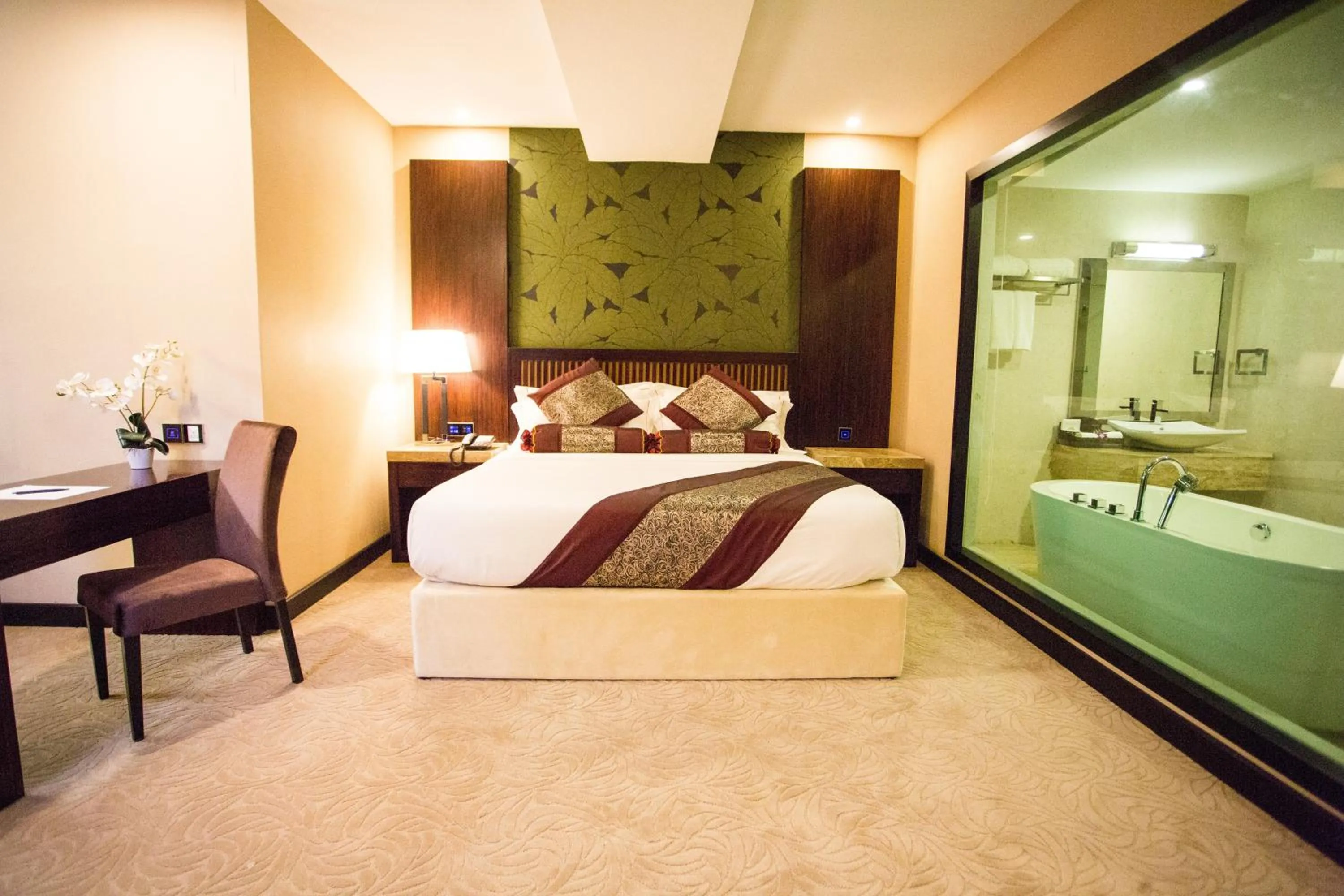 Bed in Royale Signature Hotel