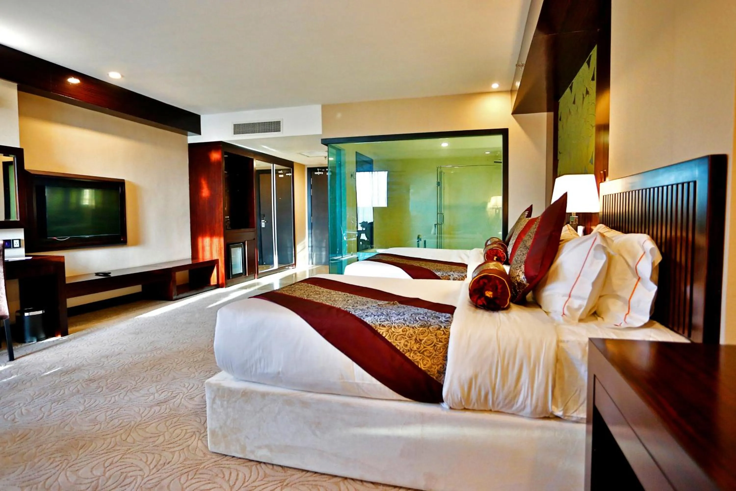 Bed in Royale Signature Hotel