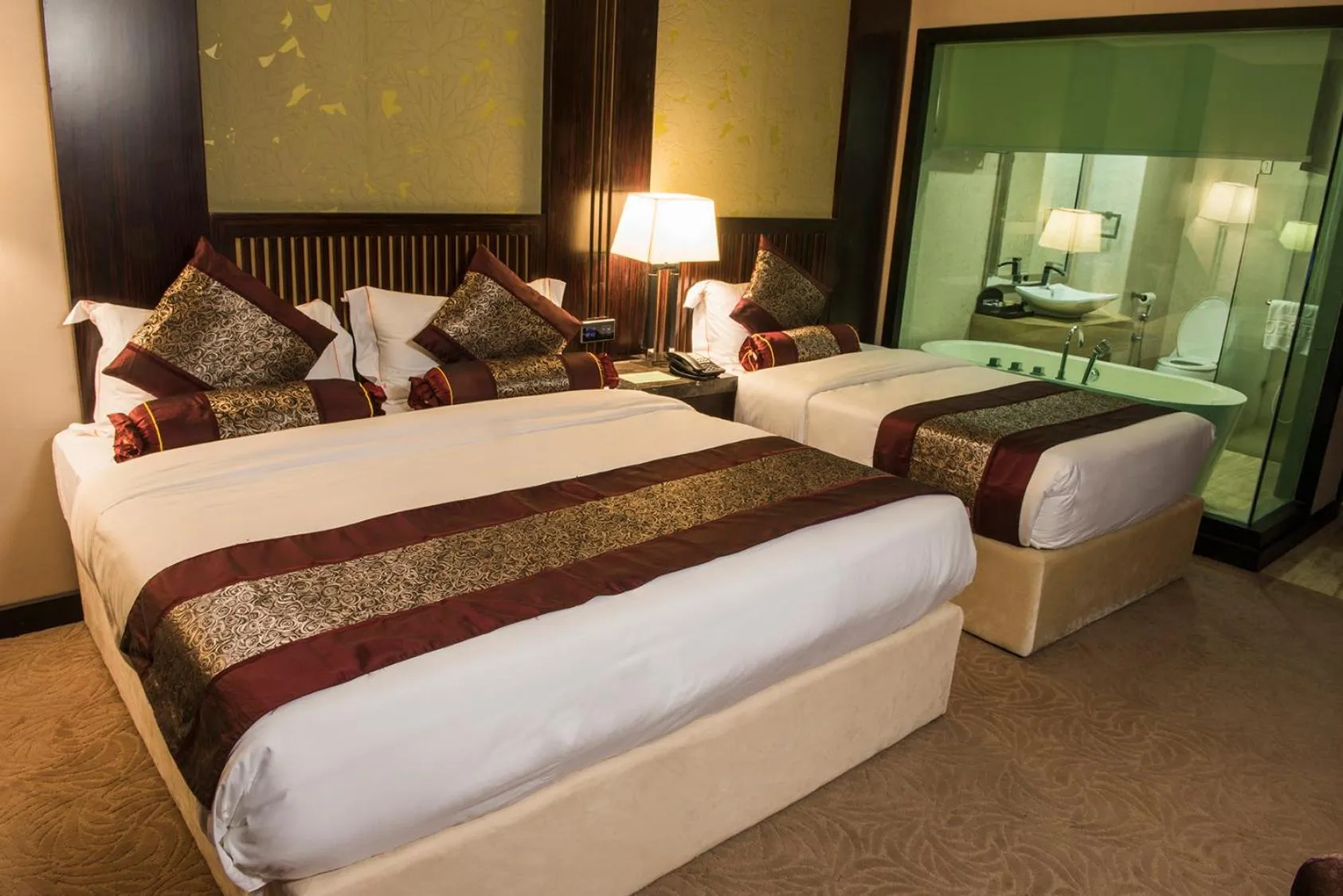 Bed in Royale Signature Hotel